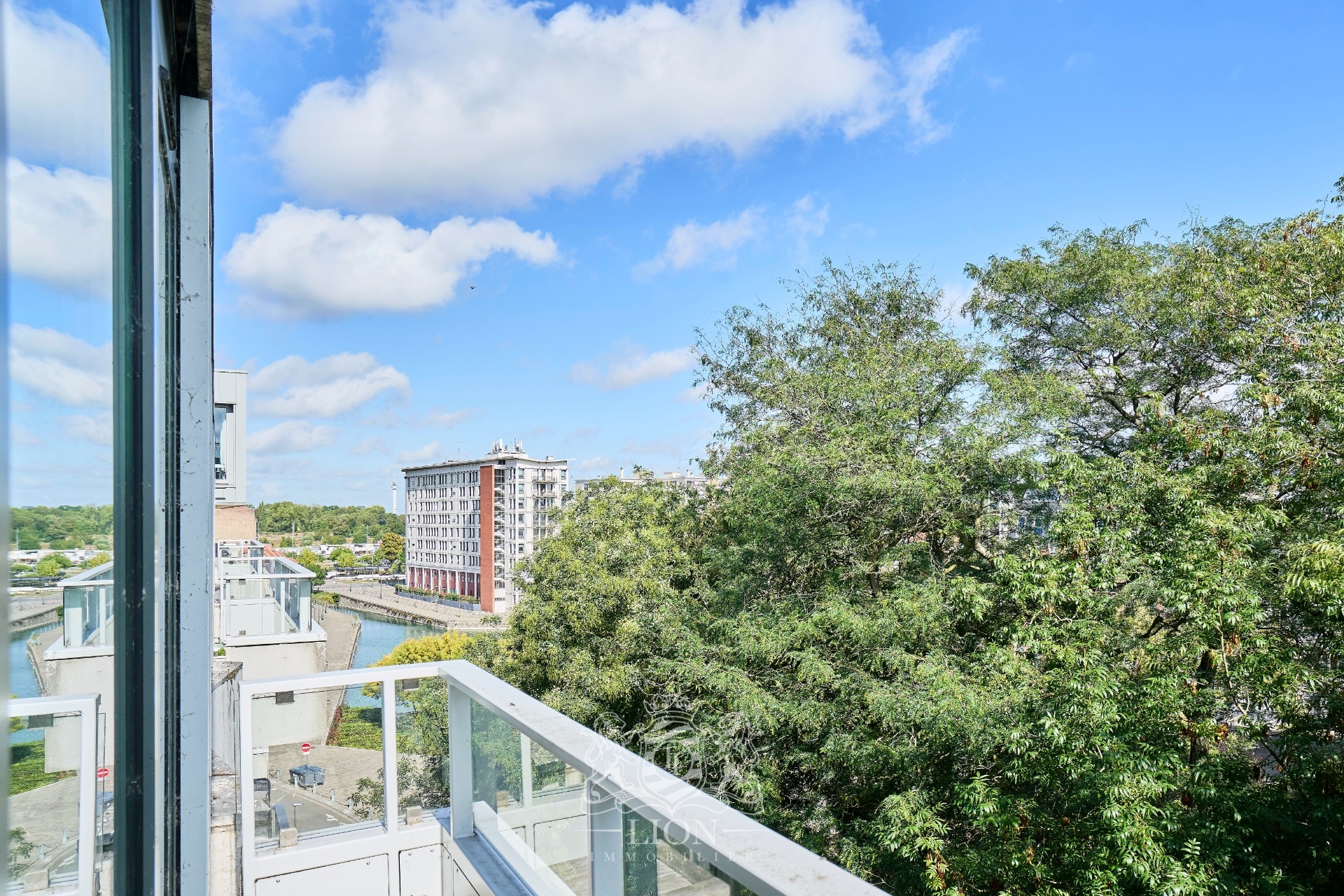 Appartement quai du wault 3 ch balcon et parking Photo 1 - Le Lion Immobilier