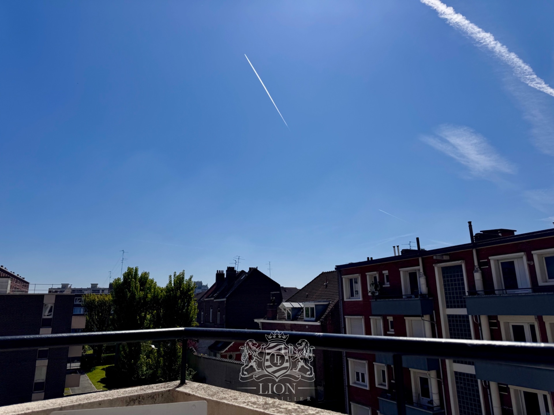 Appartement avec exterieur vue degagee et garage Photo 2 - Le Lion Immobilier