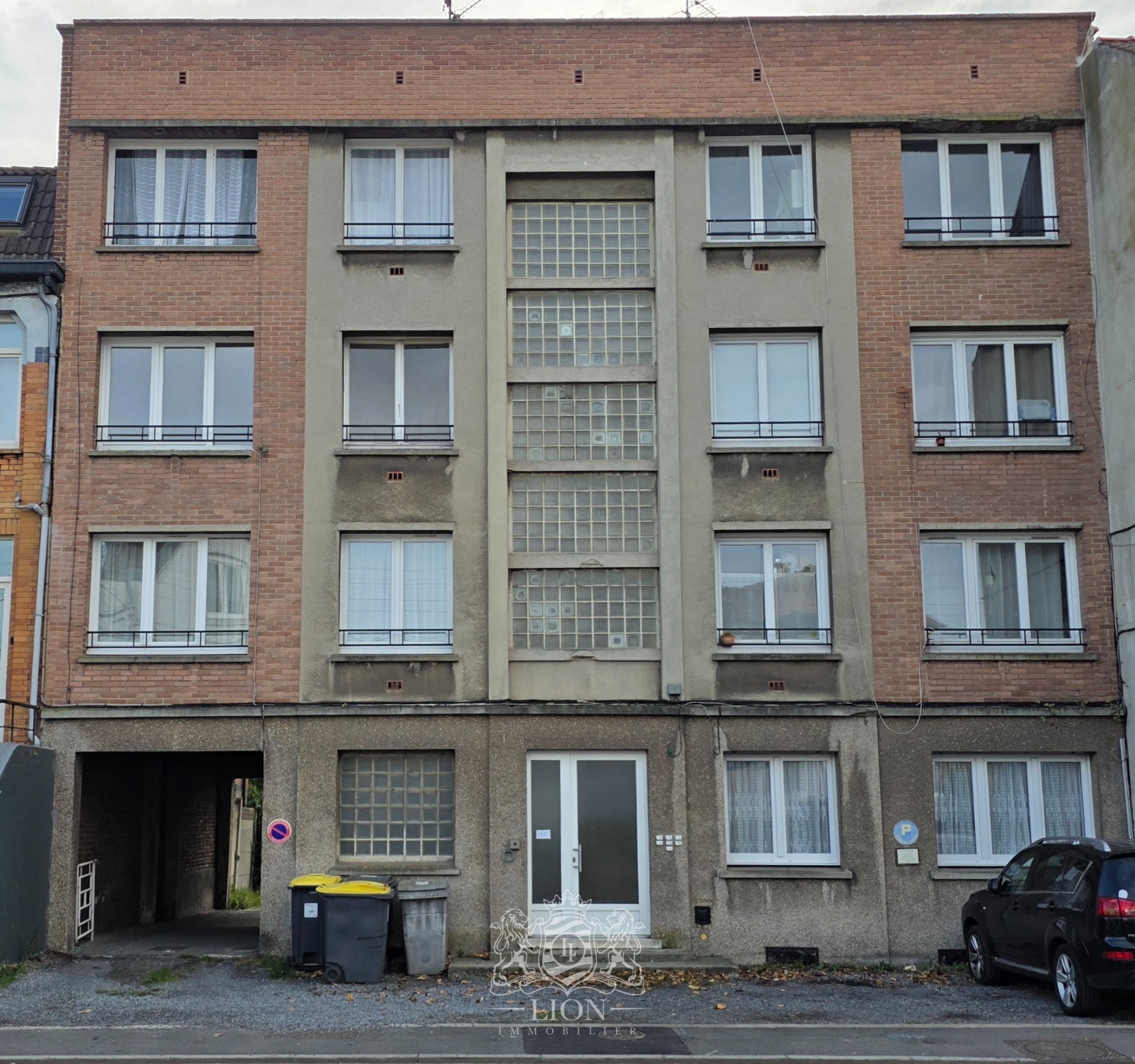 Immeuble de rapport 7 lots & 13 garages Photo 1 - Le Lion Immobilier