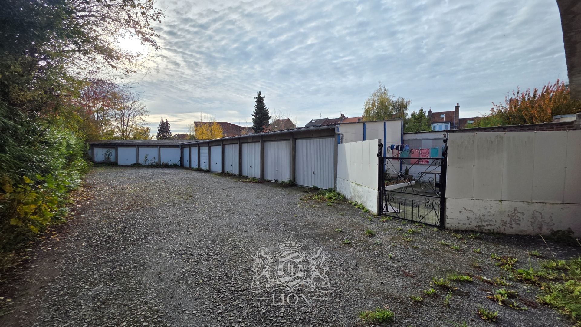 Immeuble de rapport 7 lots & 13 garages Photo 2 - Le Lion Immobilier