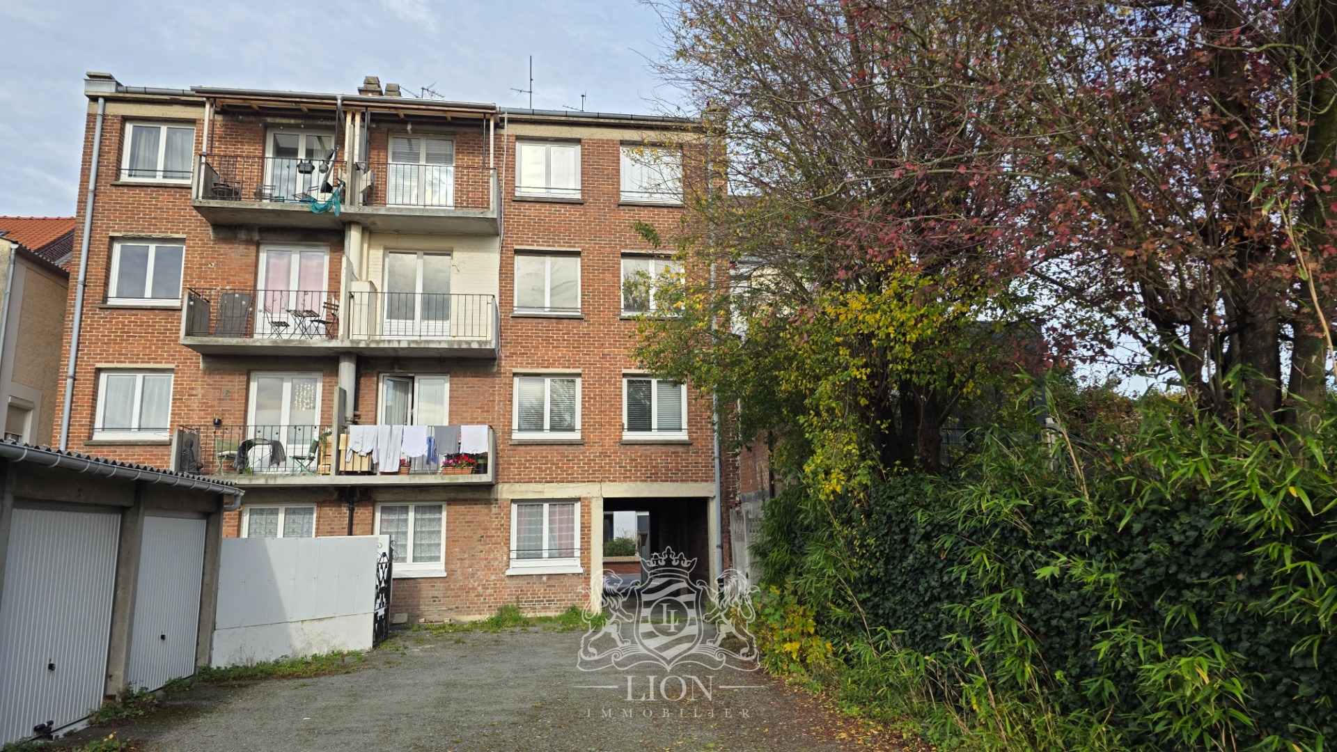 Immeuble de rapport 7 lots & 13 garages Photo 3 - Le Lion Immobilier