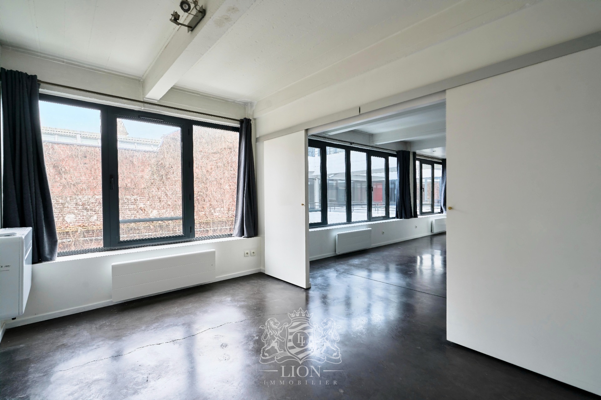 Appartement 2 chambres esprit loft et parking Photo 8 - Le Lion Immobilier
