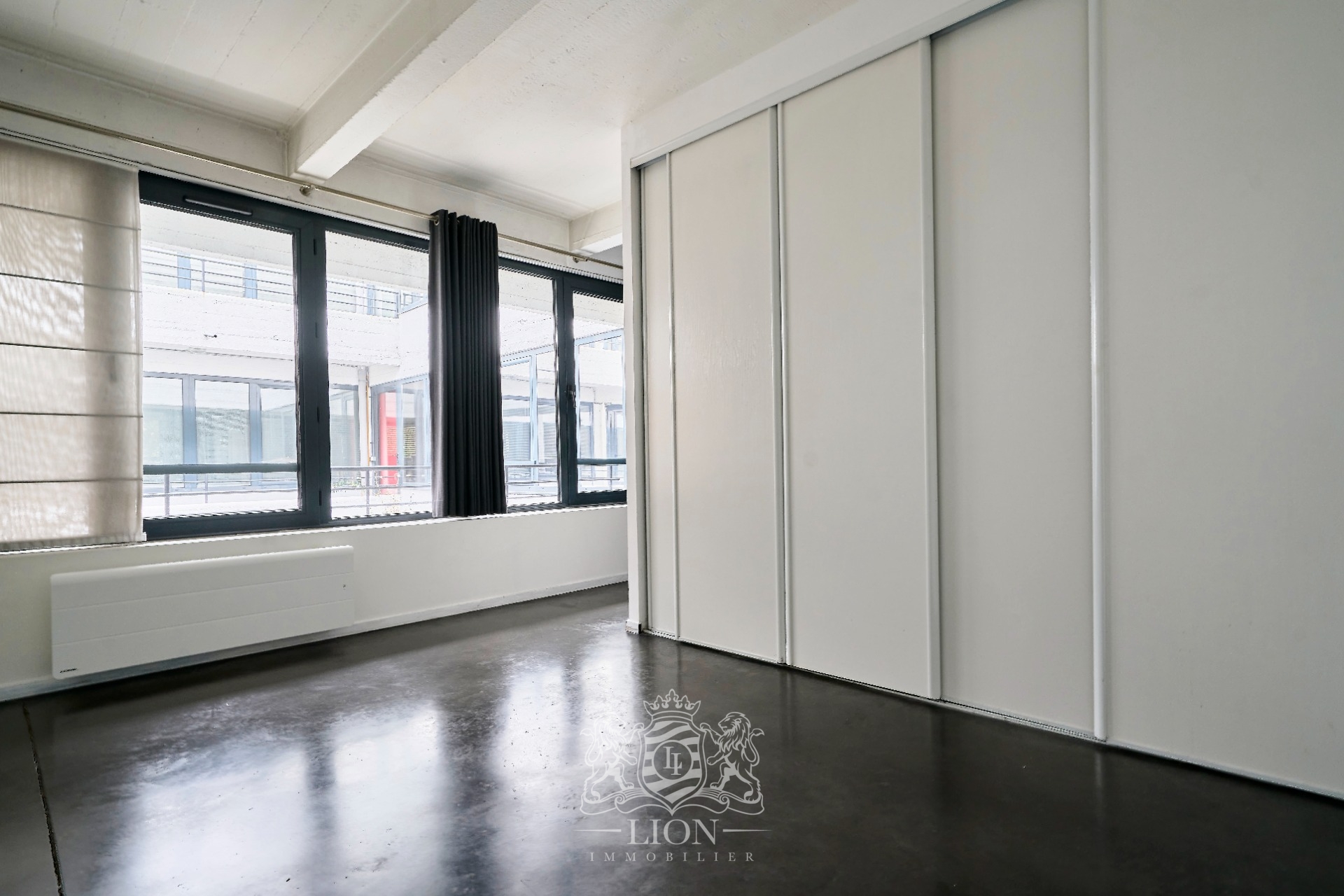 Appartement 2 chambres esprit loft et parking Photo 10 - Le Lion Immobilier