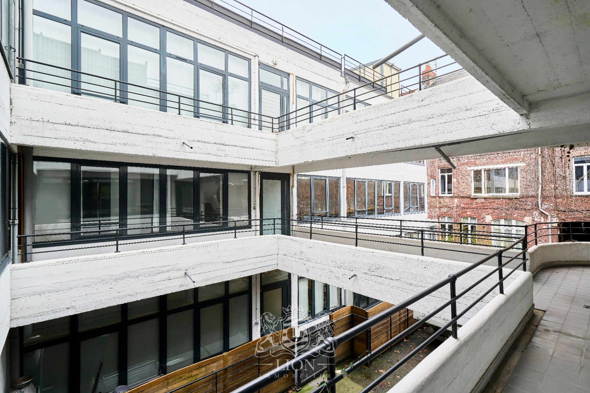 Appartement 2 chambres esprit loft et parking Photo 14 - Le Lion Immobilier