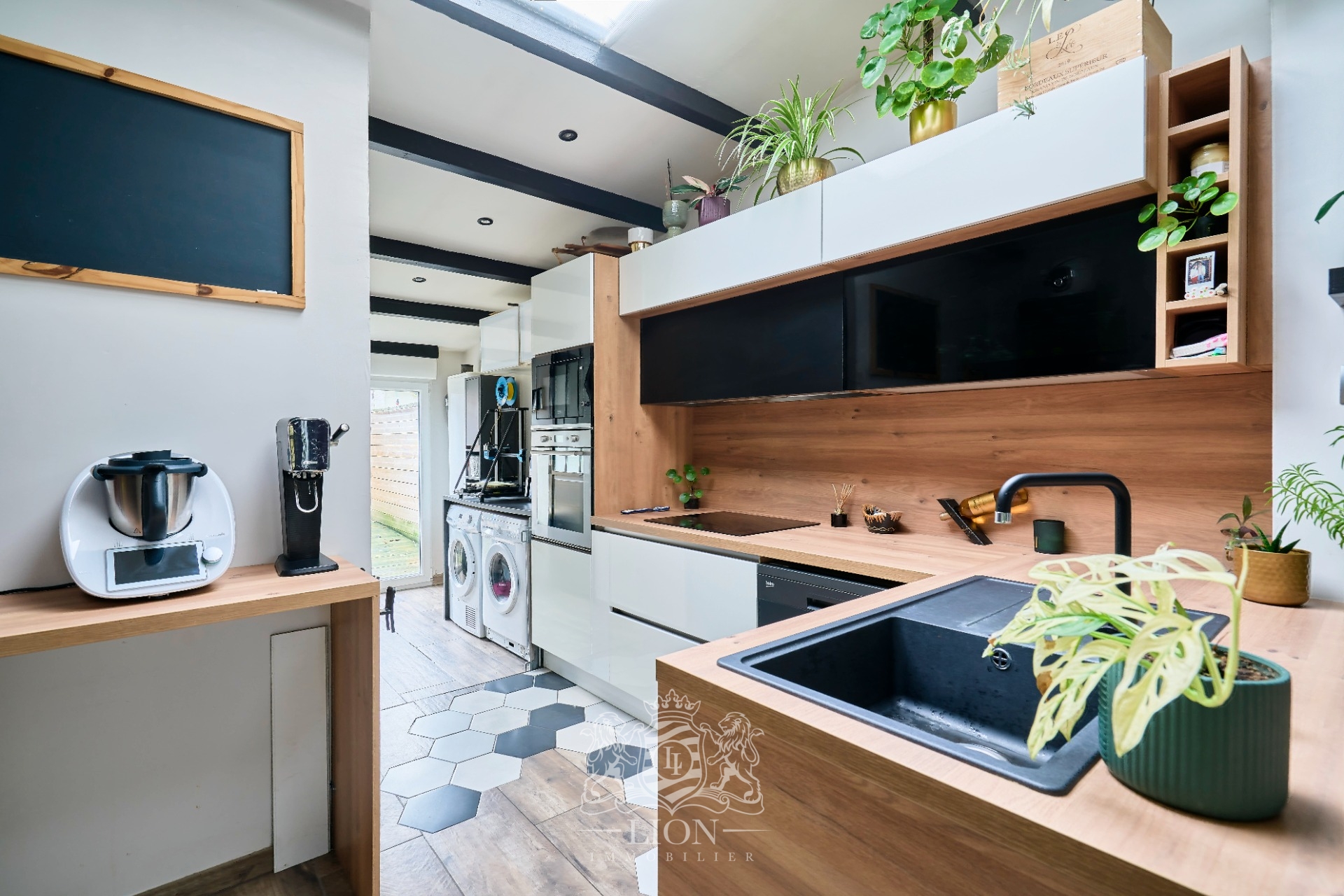 Ravissante maison deux chambres bureau et cour Photo 6 - Le Lion Immobilier