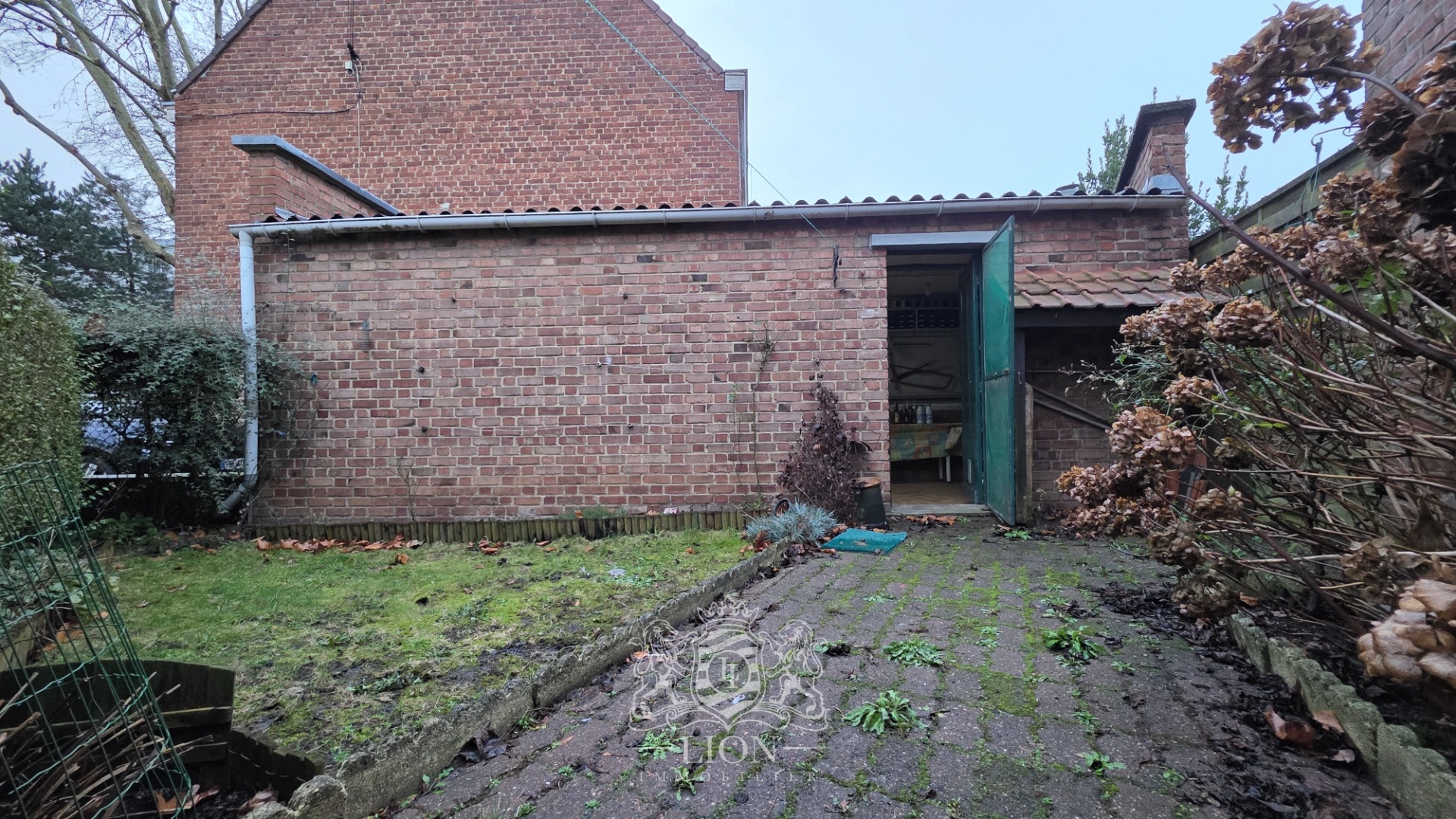 Maison de ville au fort potentiel   4 chambres grand garage Photo 1 - Le Lion Immobilier