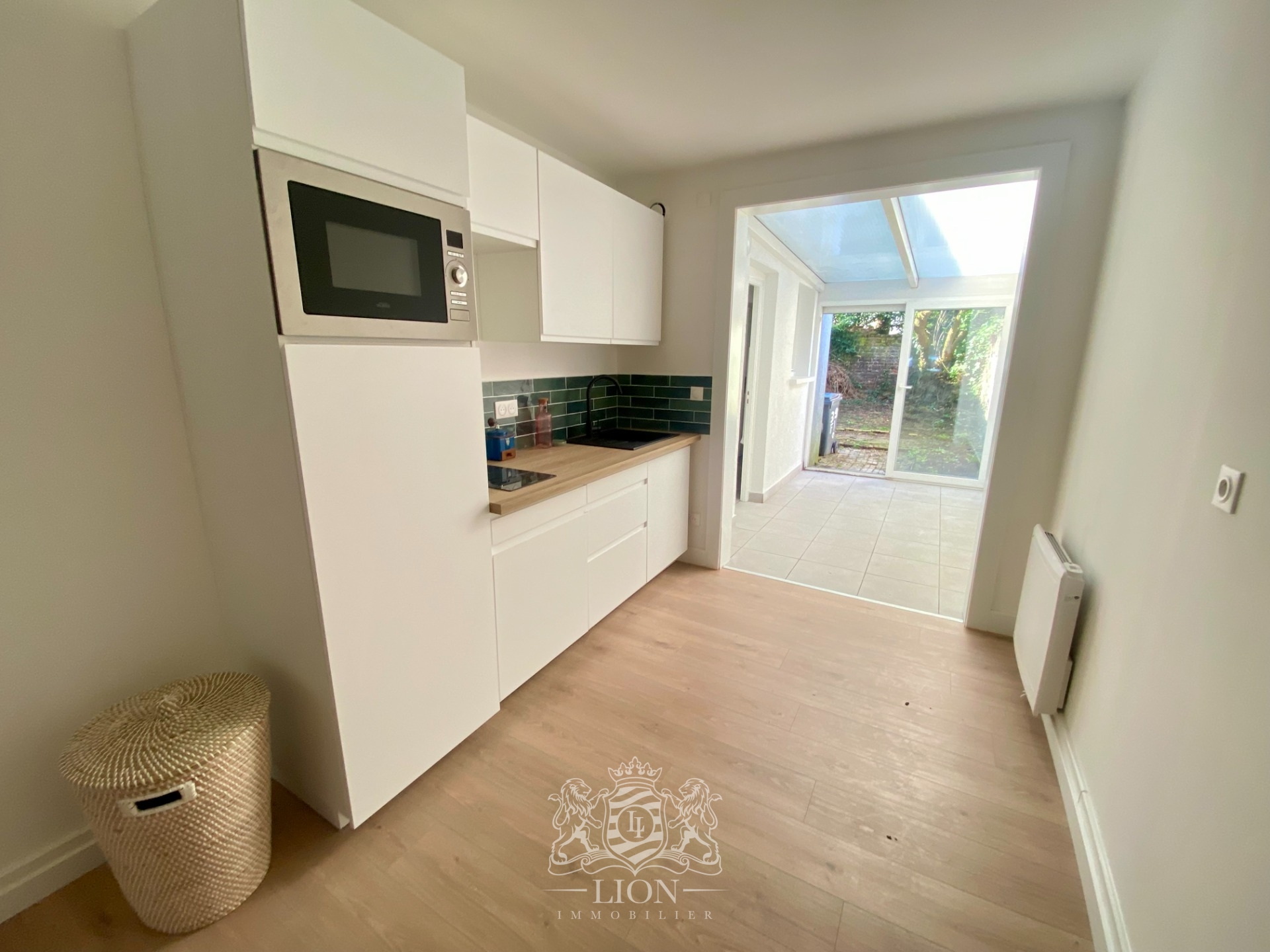 Rez de jardin t2 entierement renove proche metro Photo 3 - Le Lion Immobilier