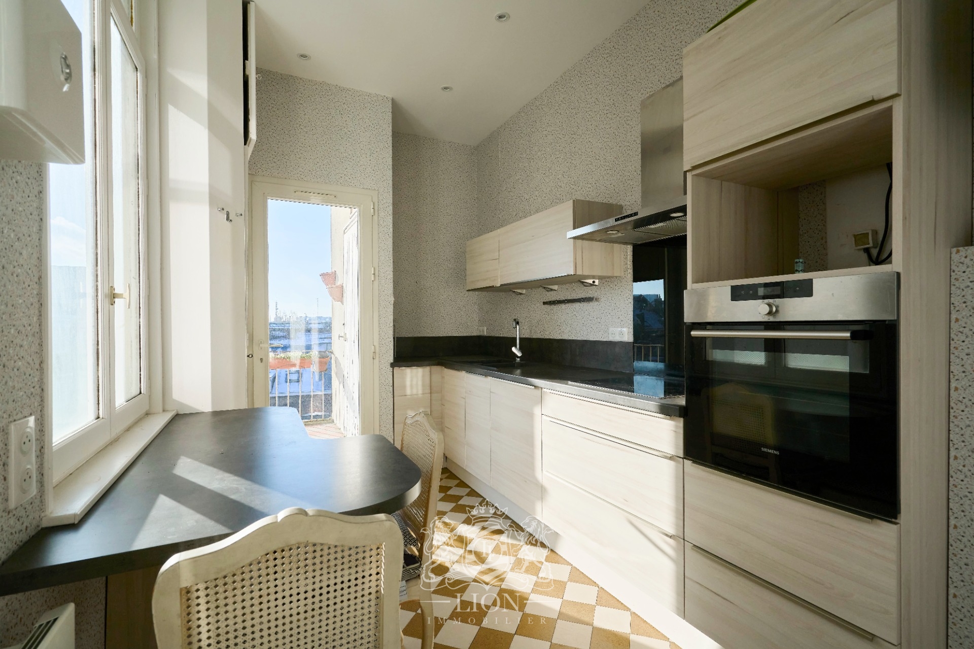 Appartement proche tramway avec terrasse et garage Photo 5 - Le Lion Immobilier