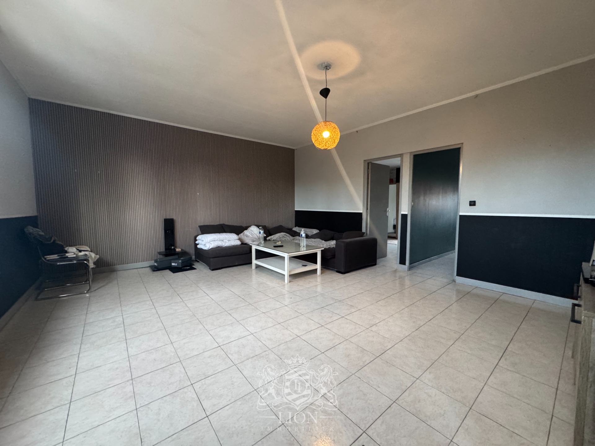 Immeuble de rapport avec commerces appartement 25 garages Photo 6 - Le Lion Immobilier