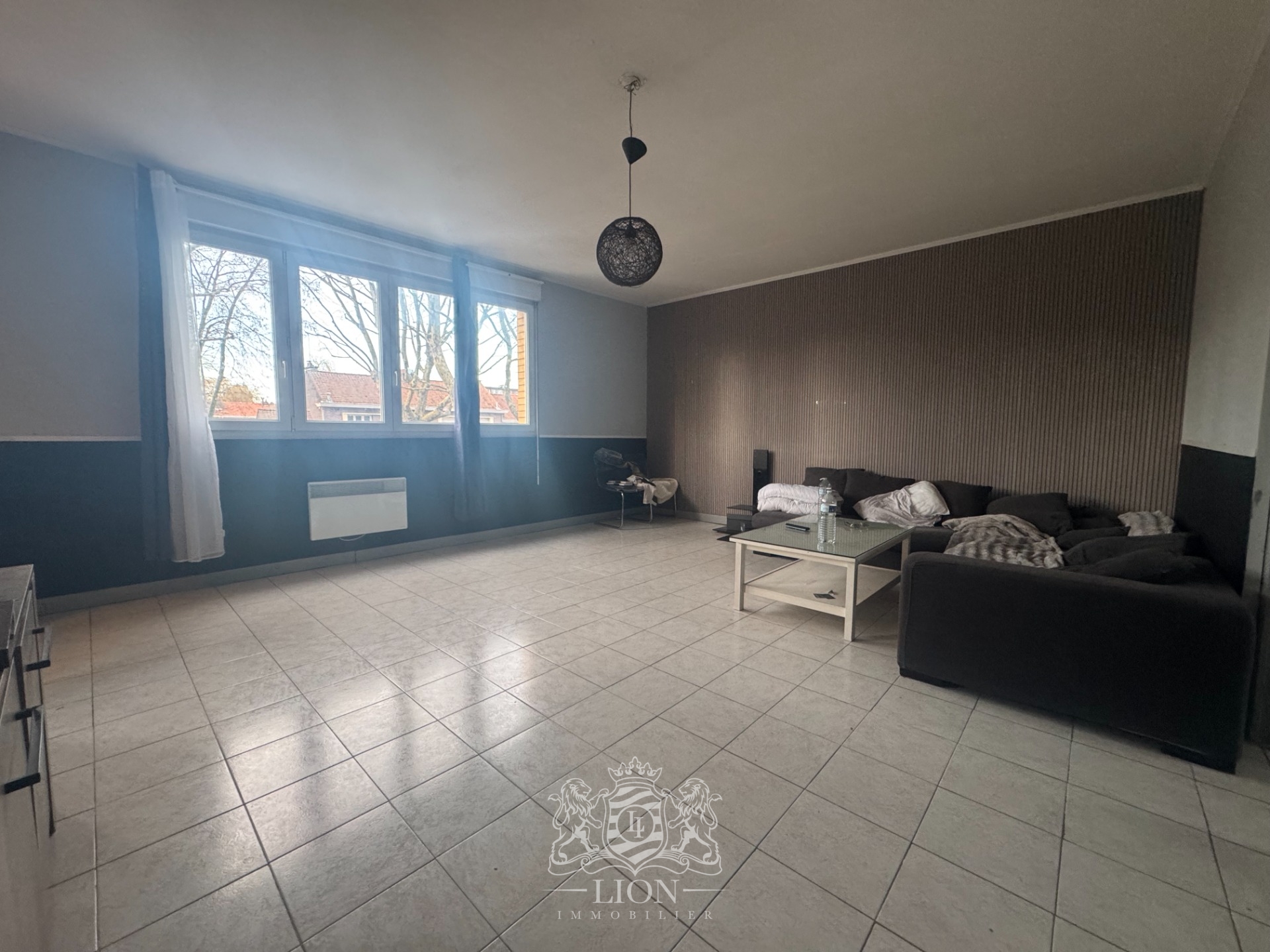 Immeuble de rapport avec commerces appartement 25 garages Photo 7 - Le Lion Immobilier