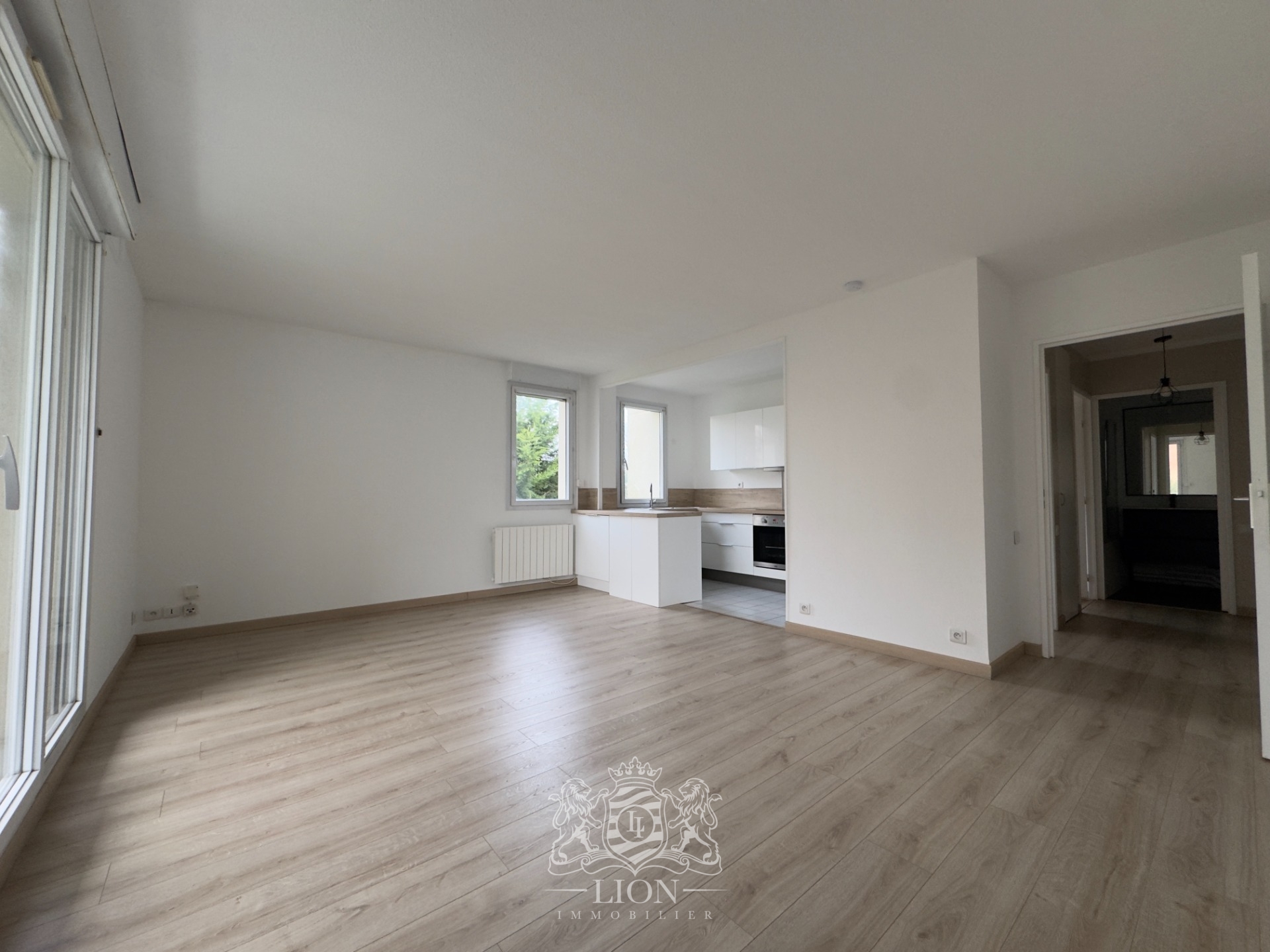 Appartement 50m2 1 chambre place de parking Photo 1 - Le Lion Immobilier