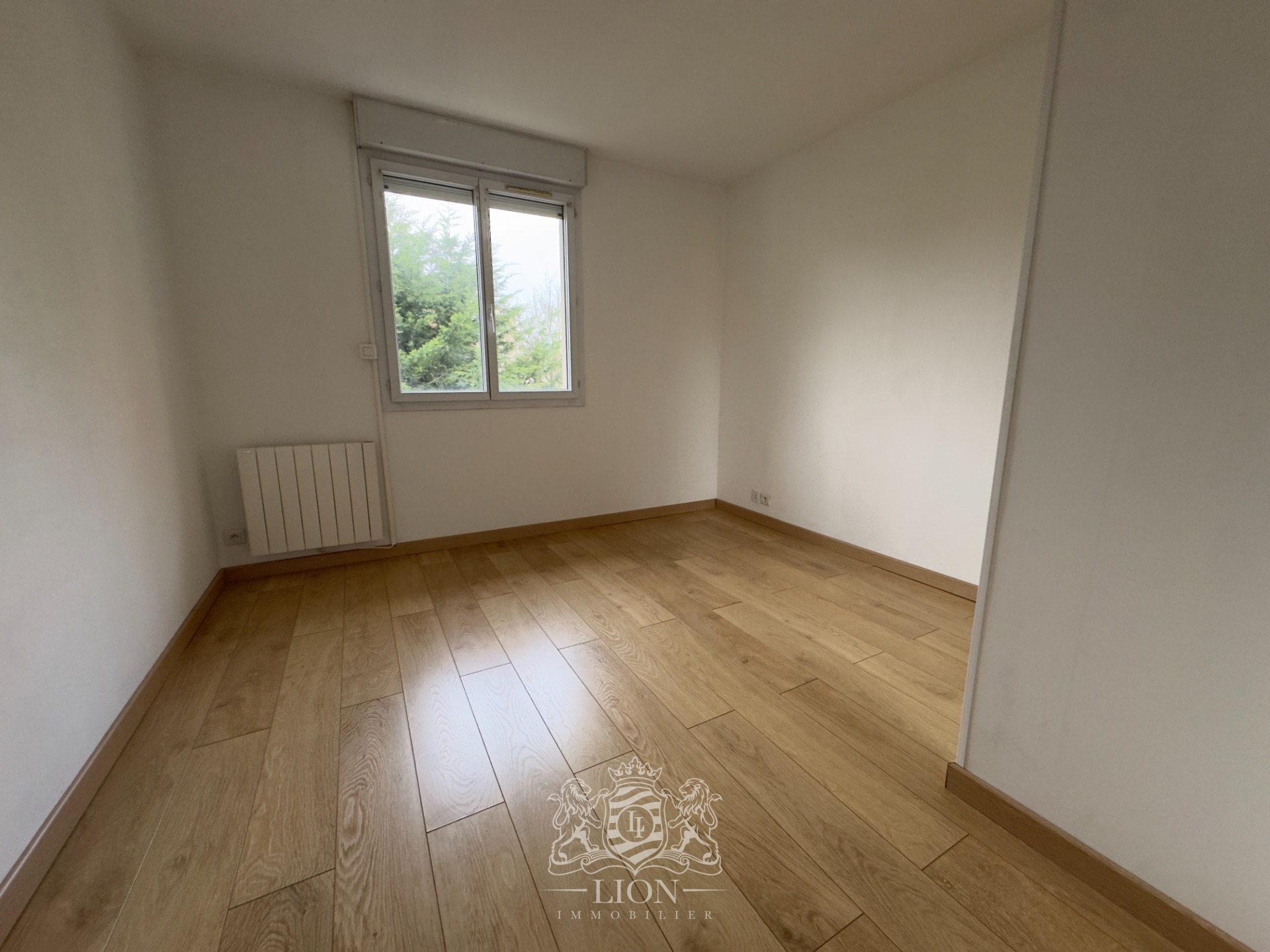 Appartement 50m2 1 chambre place de parking Photo 4 - Le Lion Immobilier