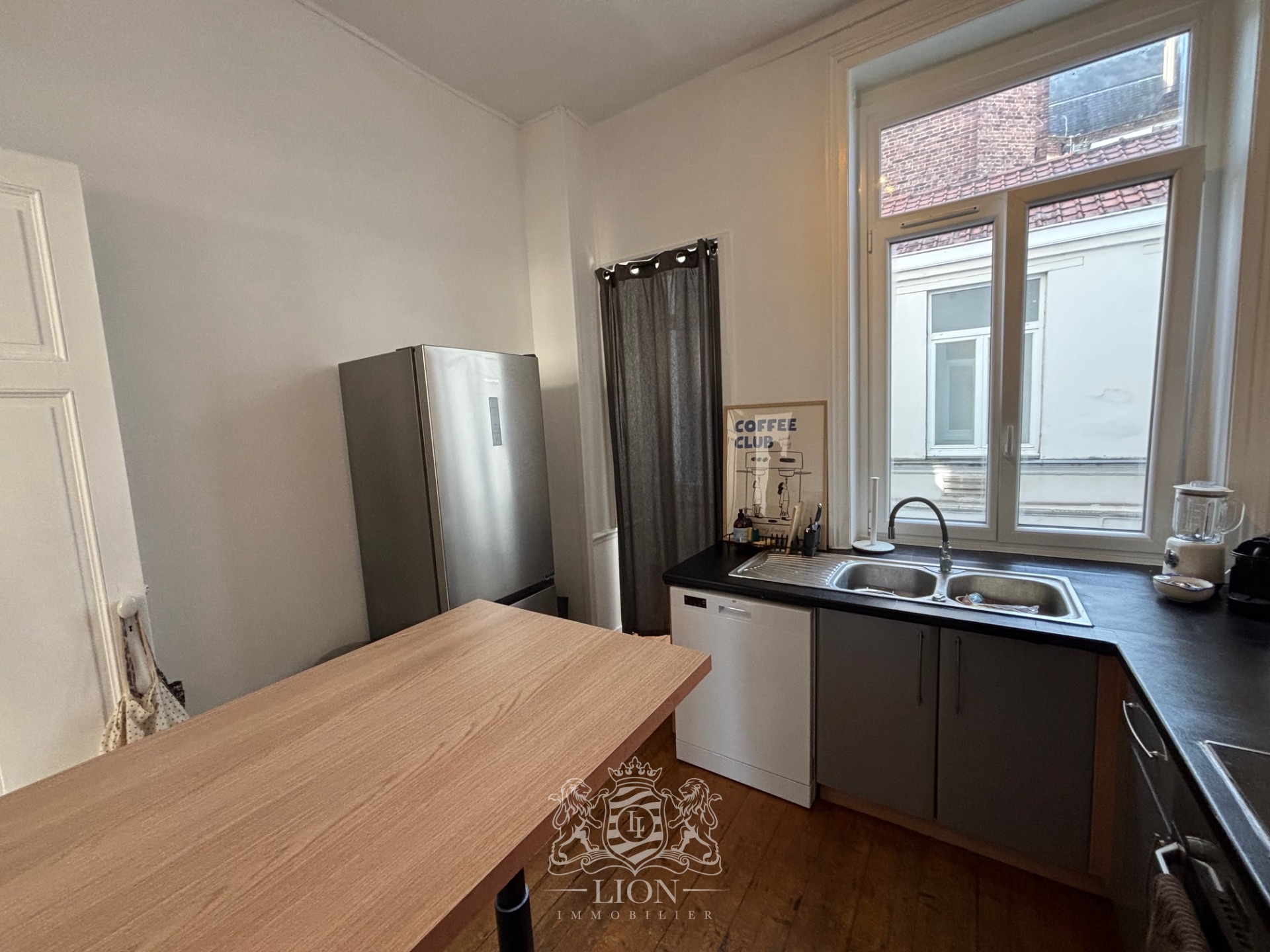 T4  deux pas de la grand place Photo 6 - Le Lion Immobilier