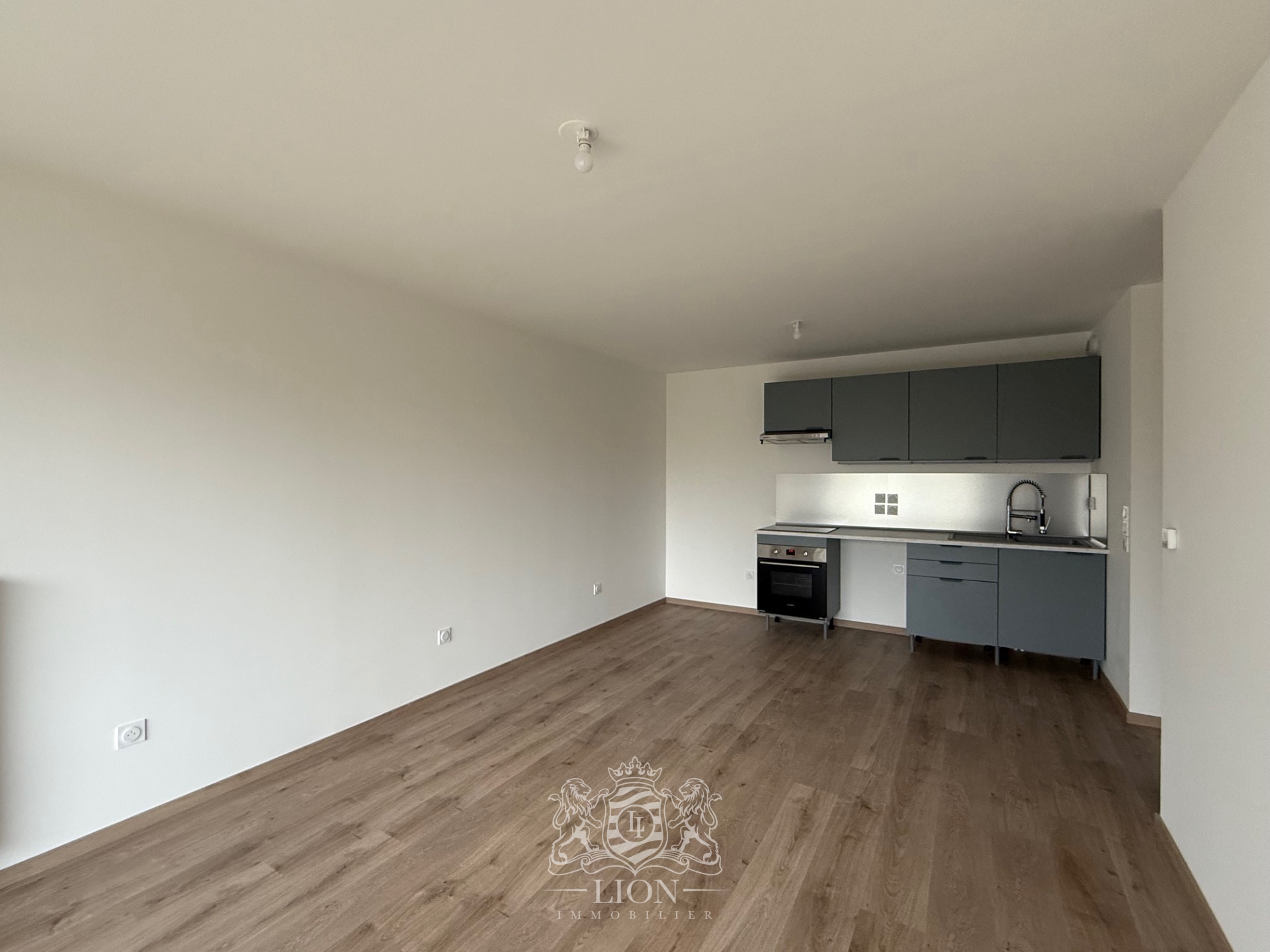 Atkk lambersart t3 avec terrasse et parking Photo 1 - Le Lion Immobilier