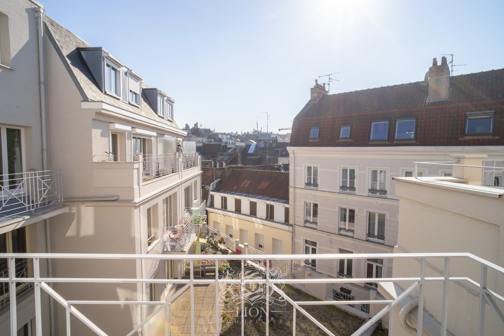 Grand place duplex dernier etage avec exterieur Photo 1 - Le Lion Immobilier