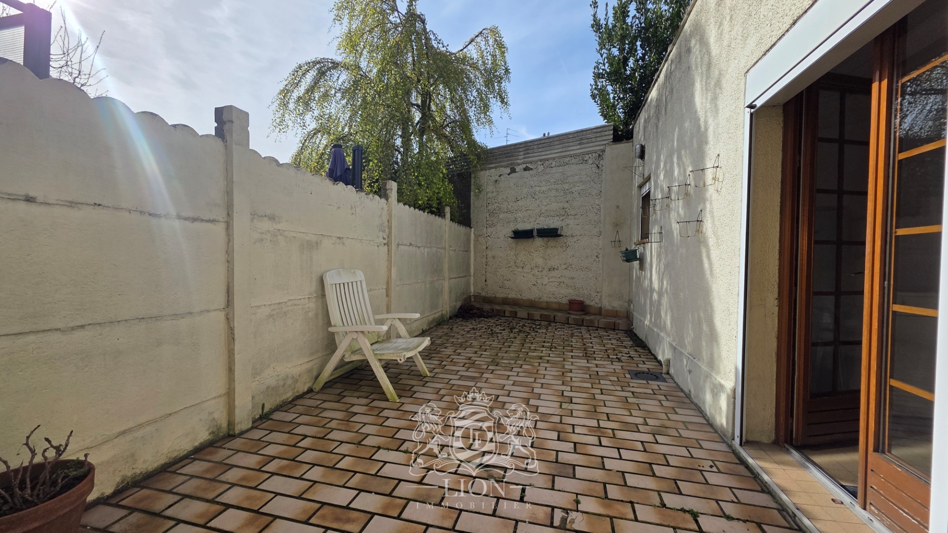 Maison de ville au fort potentiel   4 chambres grand garage Photo 4 - Le Lion Immobilier