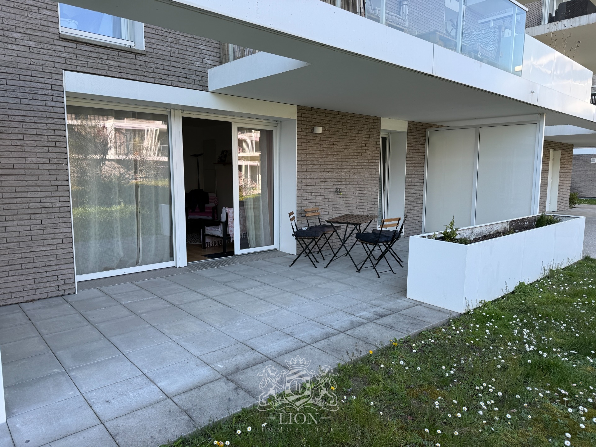 Appartement montalembert en rdc avec terrasse Photo 2 - Le Lion Immobilier