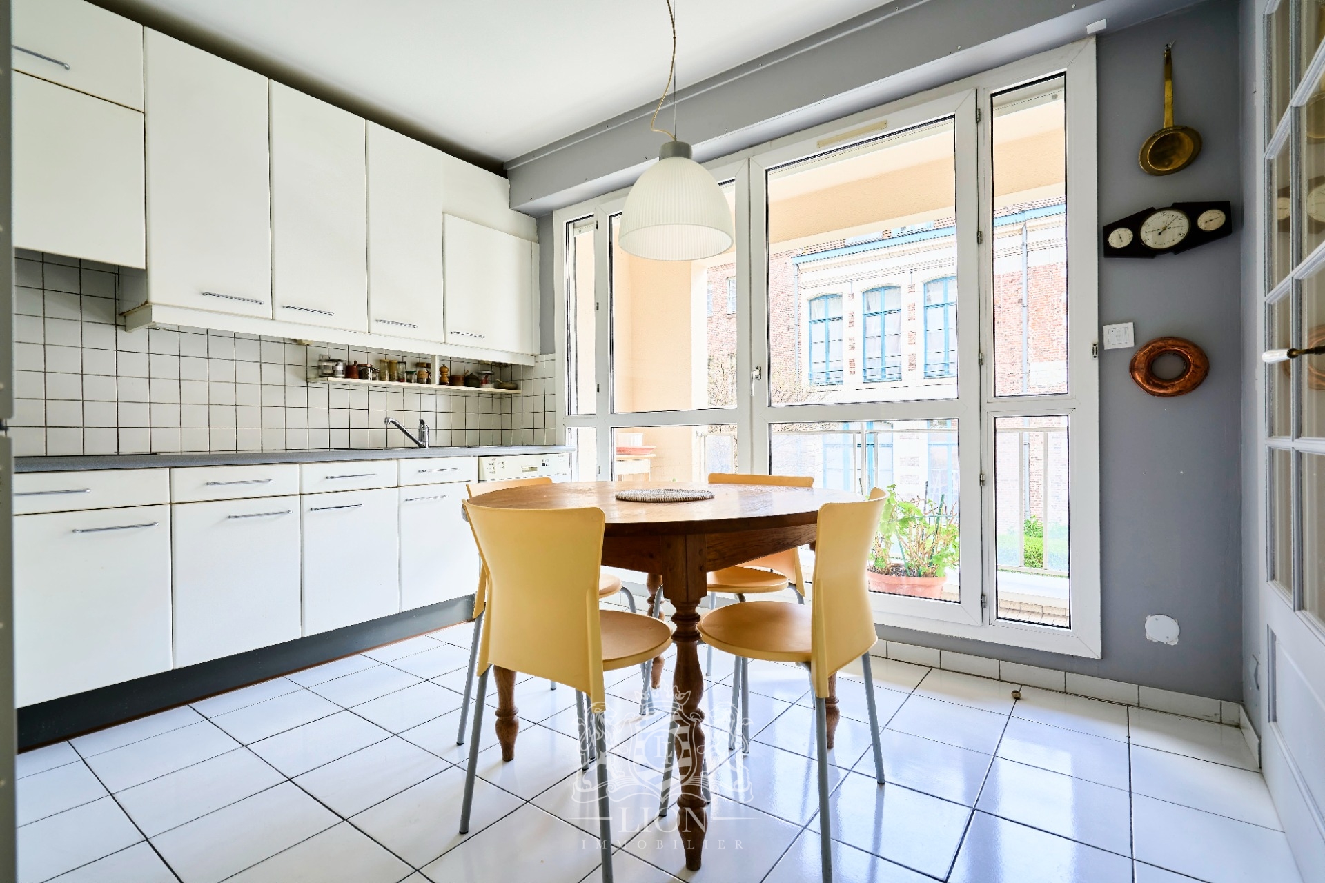 Appartement 3 ou 4 chambres balcon deux parkings  Photo 4 - Le Lion Immobilier