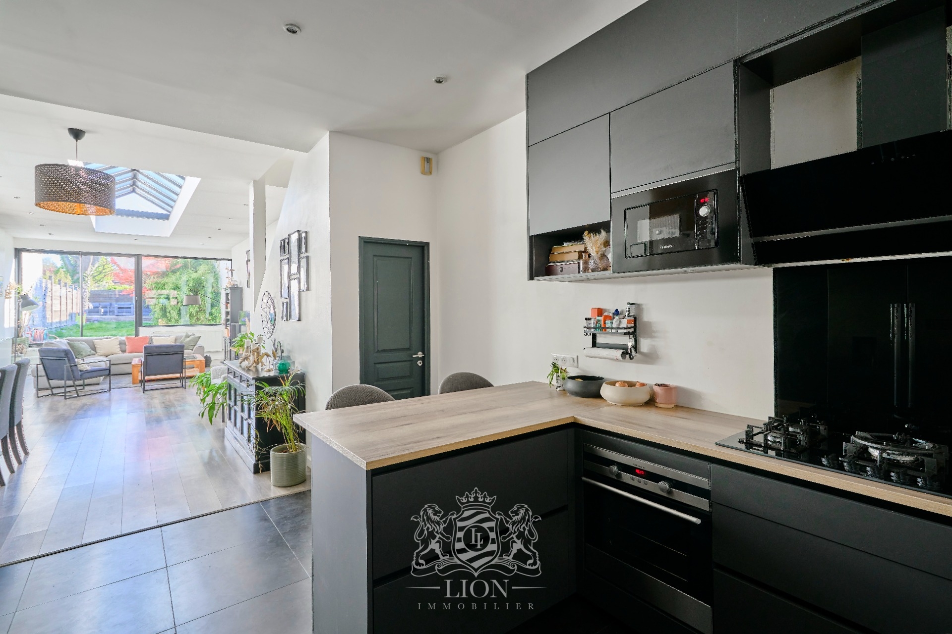 Belle maison ancienne proche tramway 3 chambres jardin Photo 1 - Le Lion Immobilier Belle maison ancienne proche tramway 3 chambres jardin Photo 1 - Le Lion Immobilier