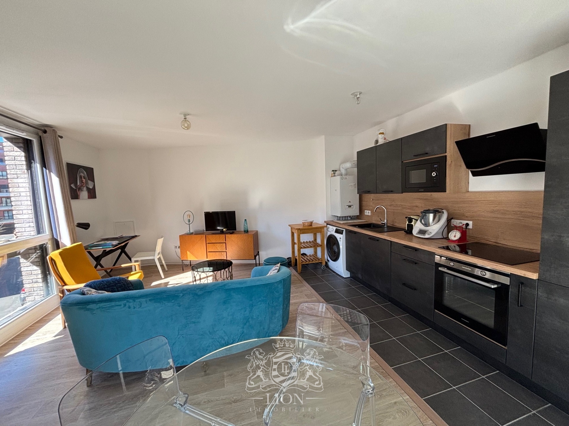 Lille centre porte de paris t2 balcon parking Photo 1 - Le Lion Immobilier