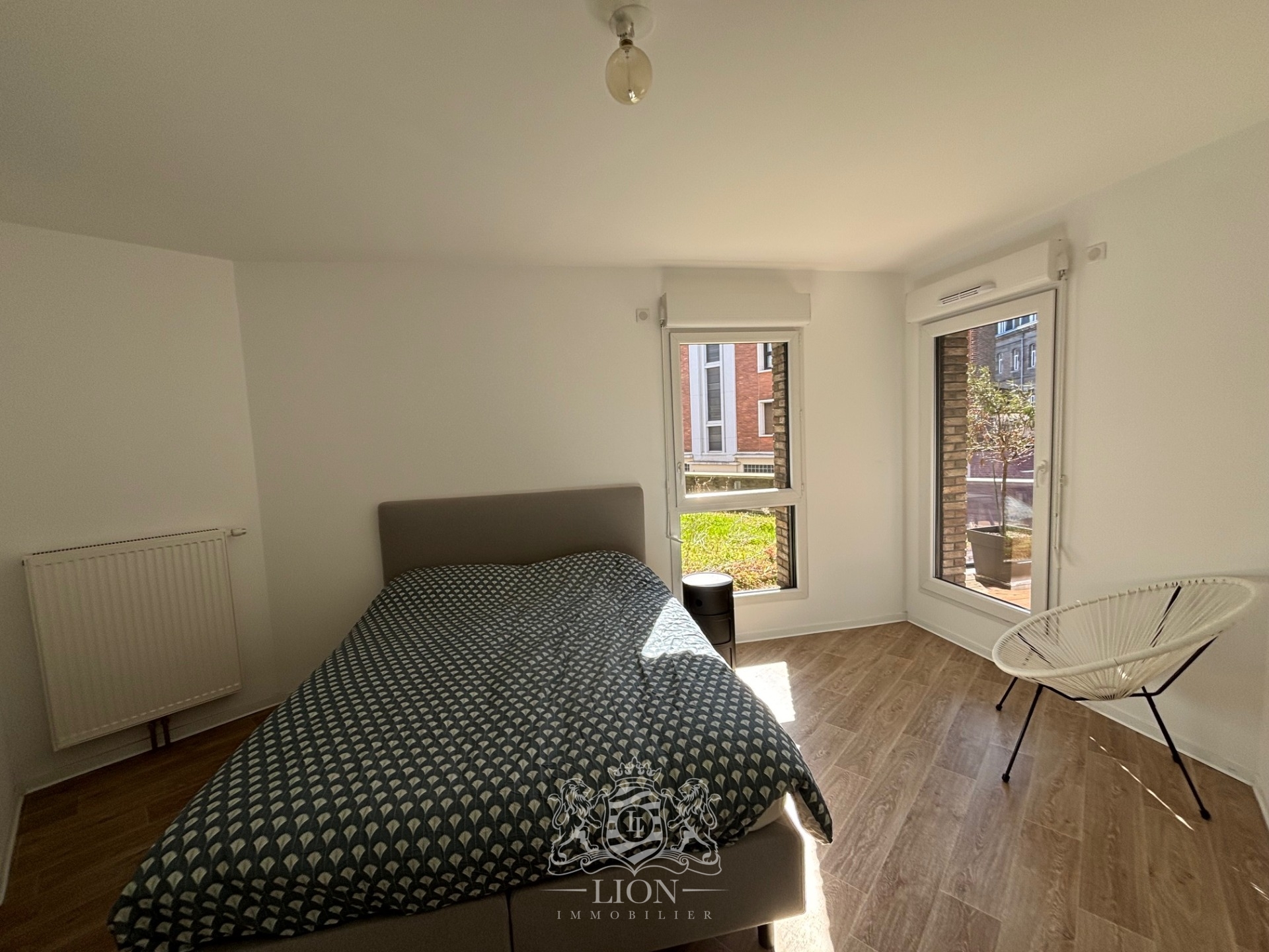 Lille centre porte de paris t2 balcon parking Photo 6 - Le Lion Immobilier Lille centre porte de paris t2 balcon parking Photo 6 - Le Lion Immobilier