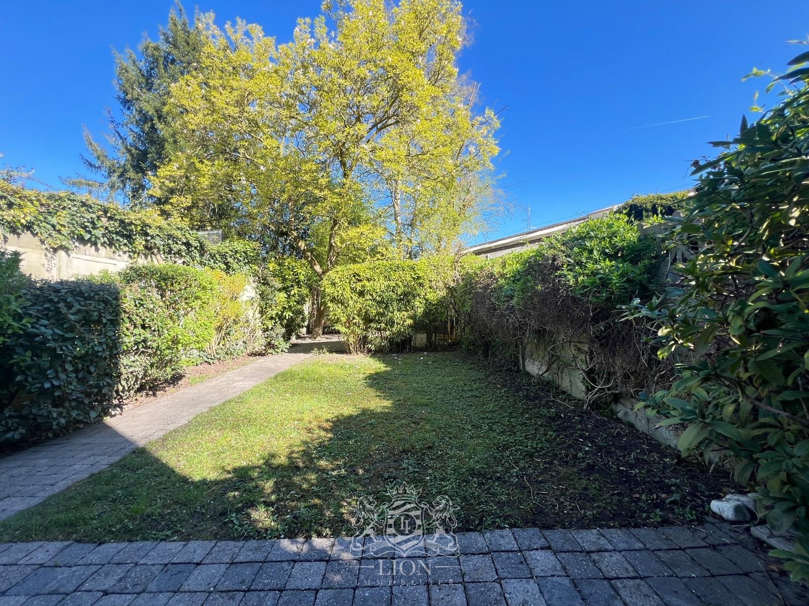 Bel etage hippodrome garage et jardin Photo 1 - Le Lion Immobilier