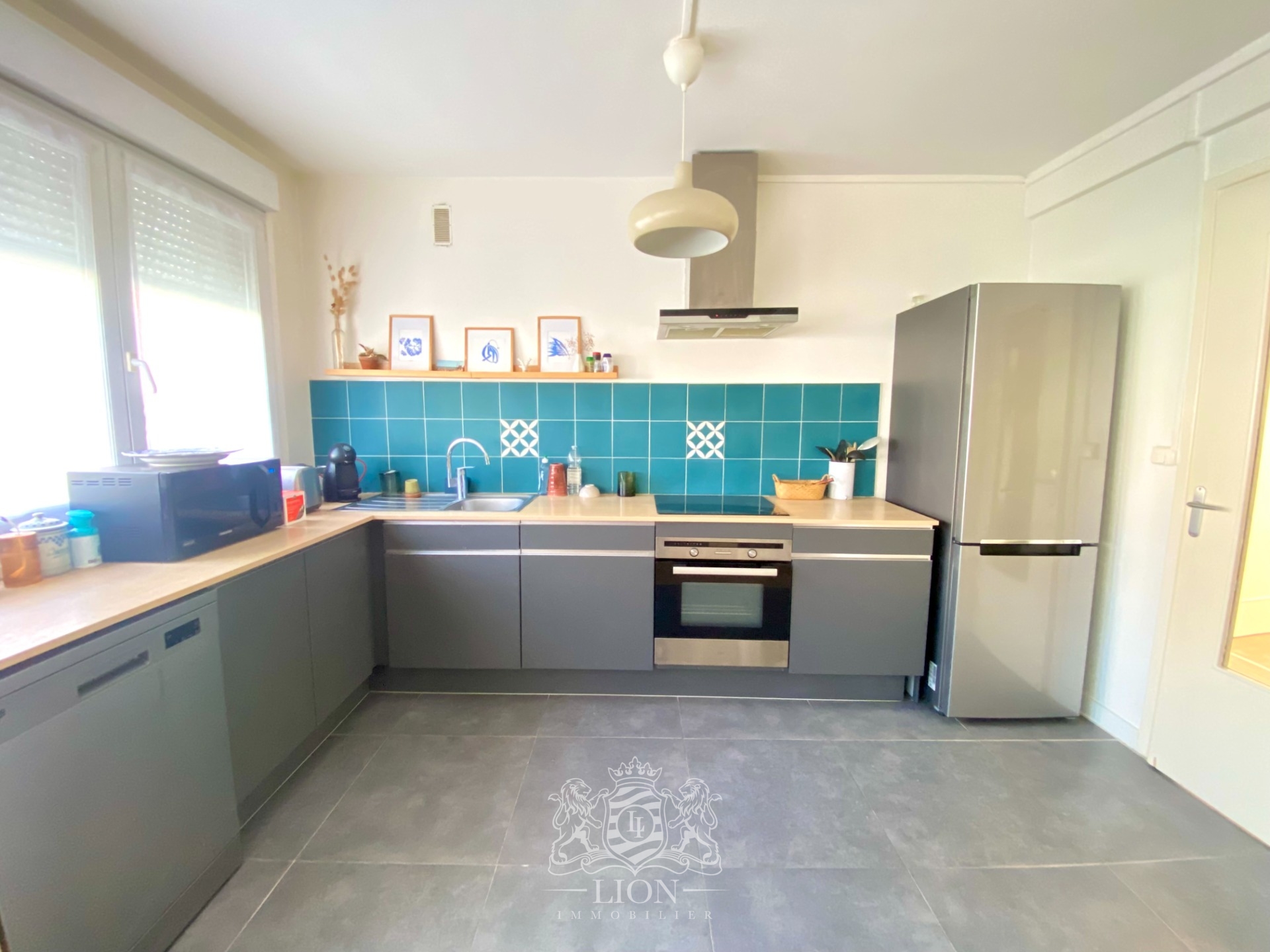 Appartement trois chambres avec jardin commun  Photo 5 - Le Lion Immobilier