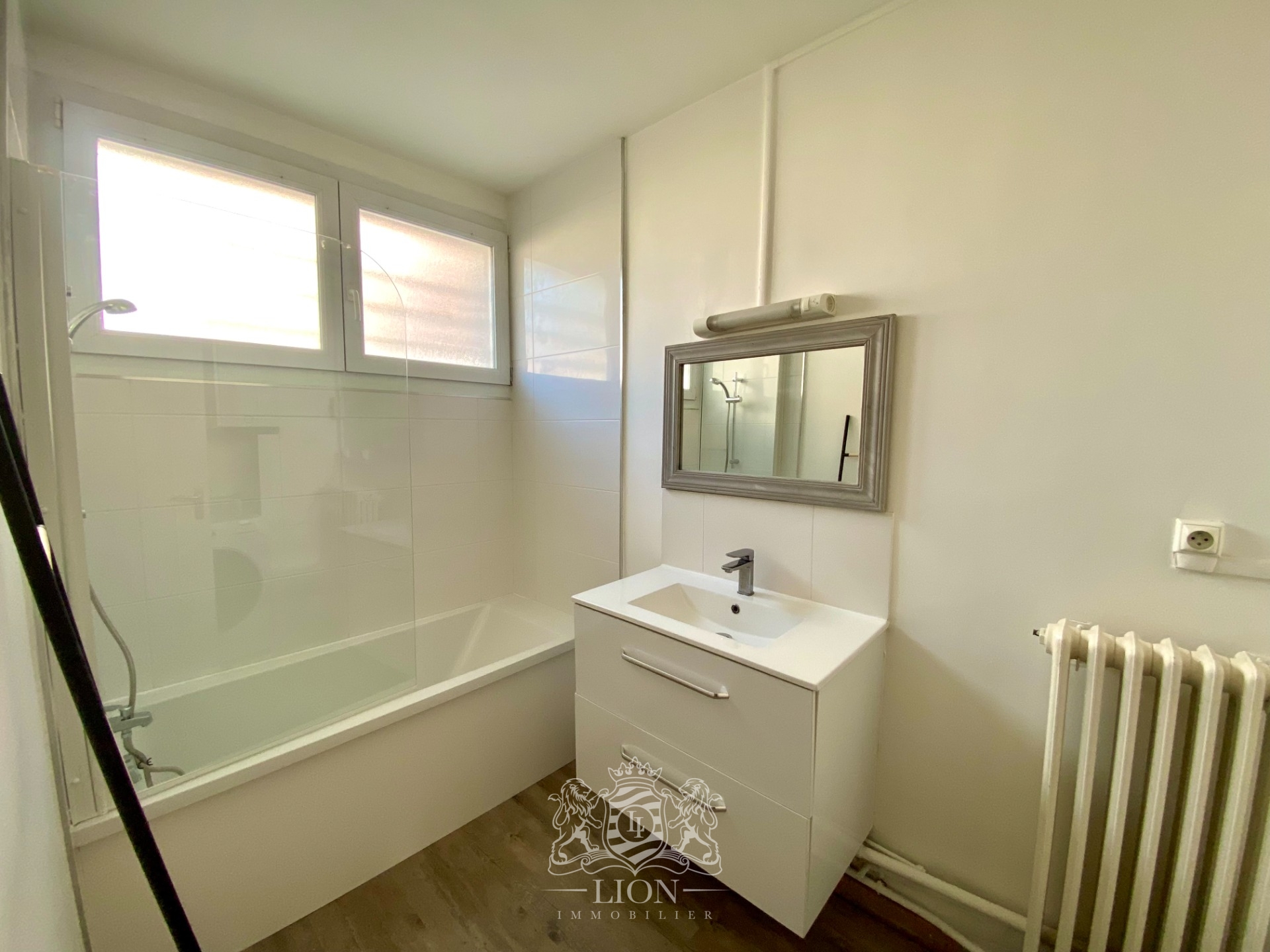 Appartement trois chambres avec jardin commun  Photo 9 - Le Lion Immobilier