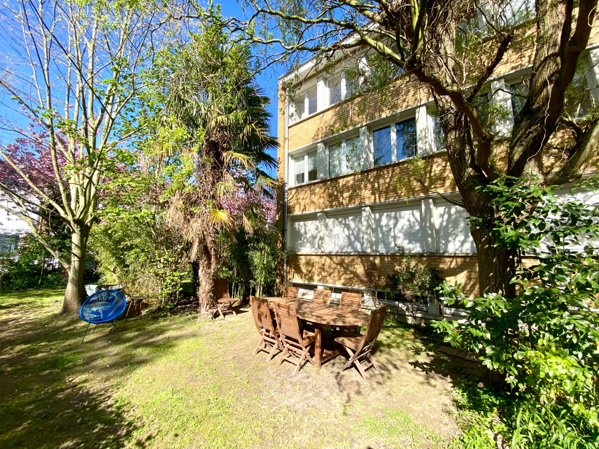 Appartement trois chambres avec jardin commun  Photo 10 - Le Lion Immobilier