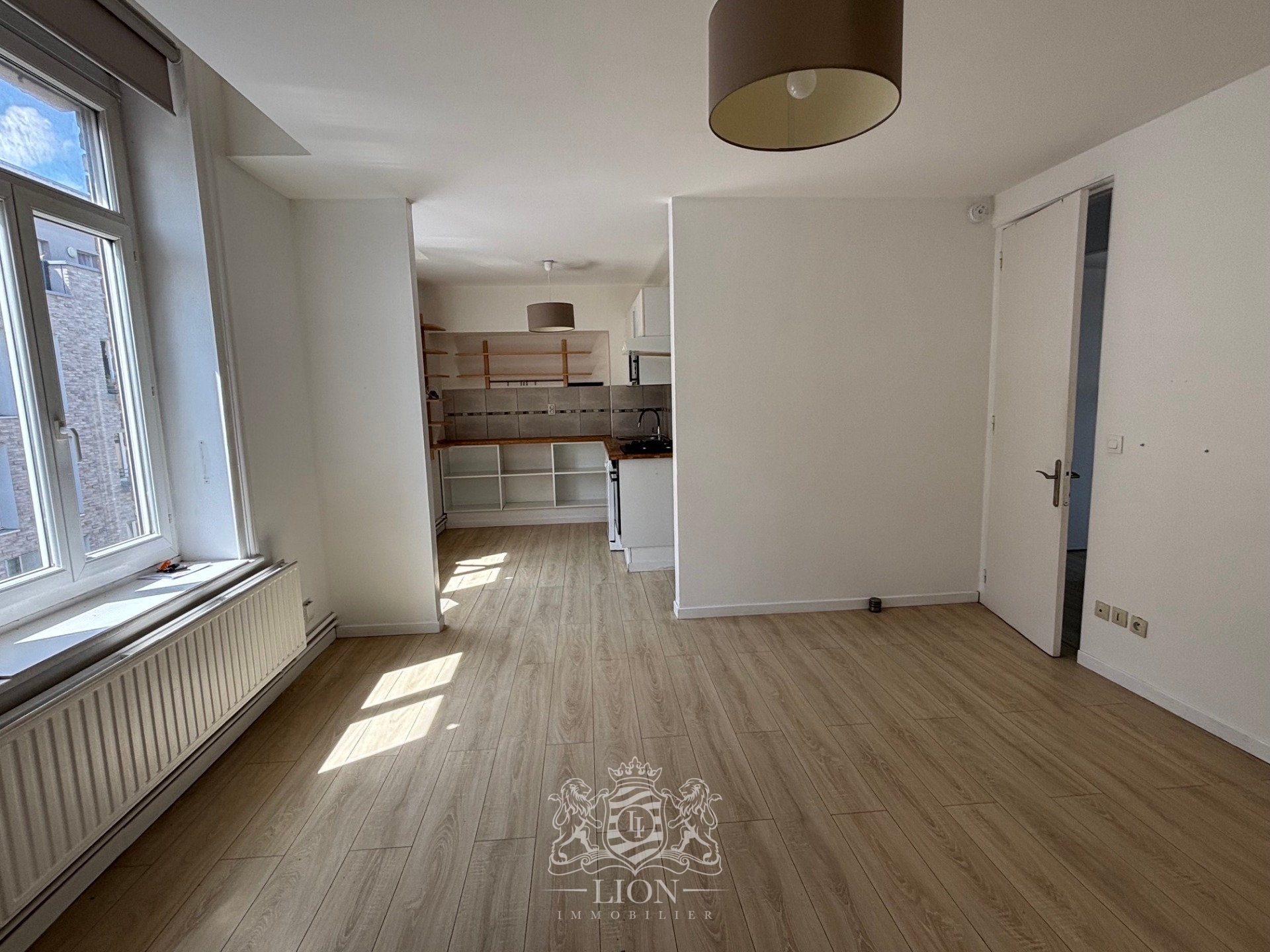 Rue gantois appartement type 2 50m Photo 1 - Le Lion Immobilier