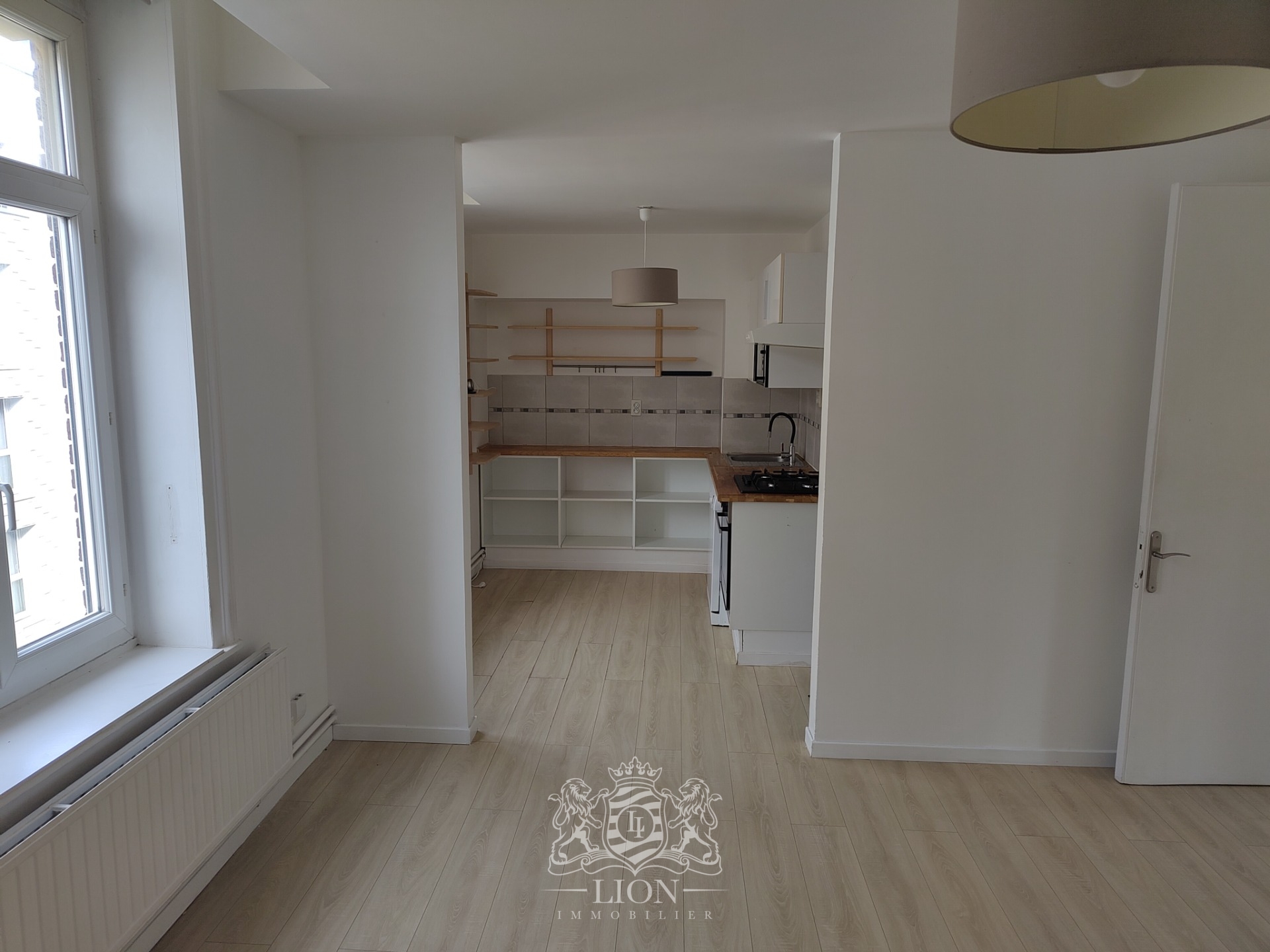 Rue gantois appartement type 2 50m Photo 2 - Le Lion Immobilier