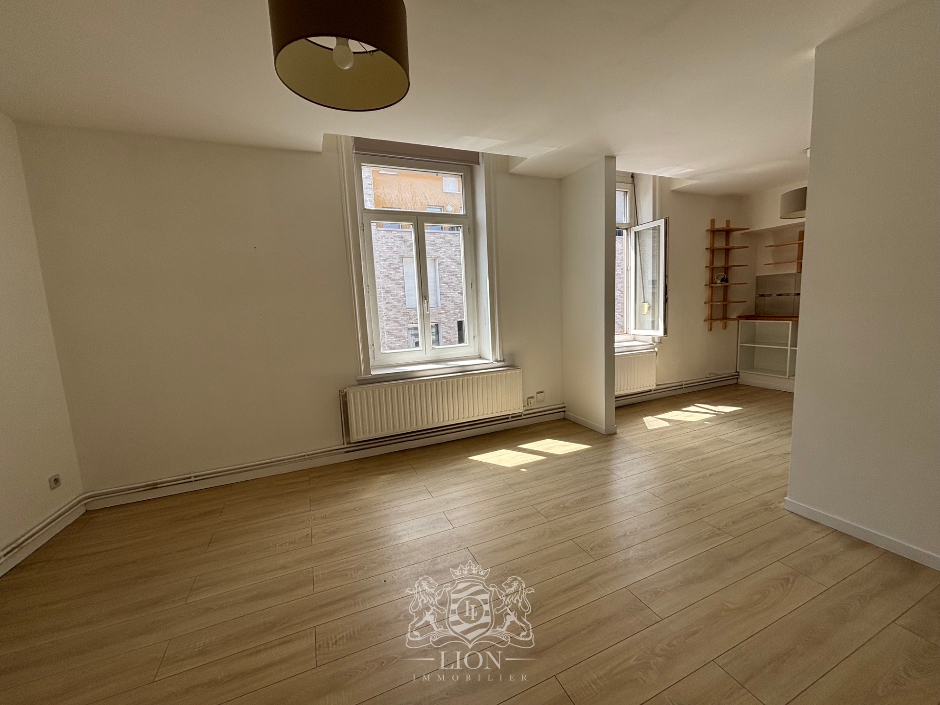 Rue gantois appartement type 2 50m Photo 2 - Le Lion Immobilier
