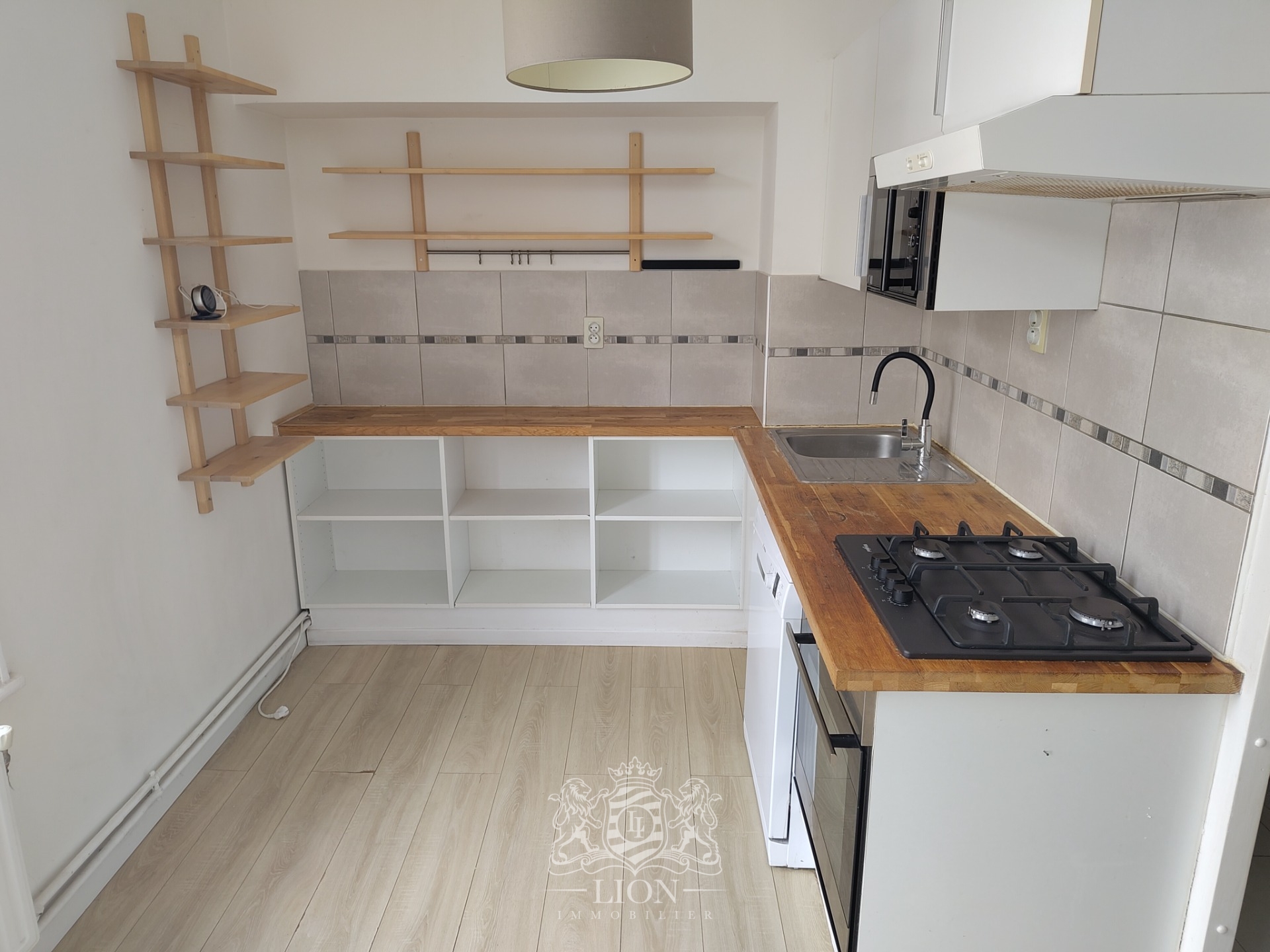 Rue gantois appartement type 2 50m Photo 3 - Le Lion Immobilier