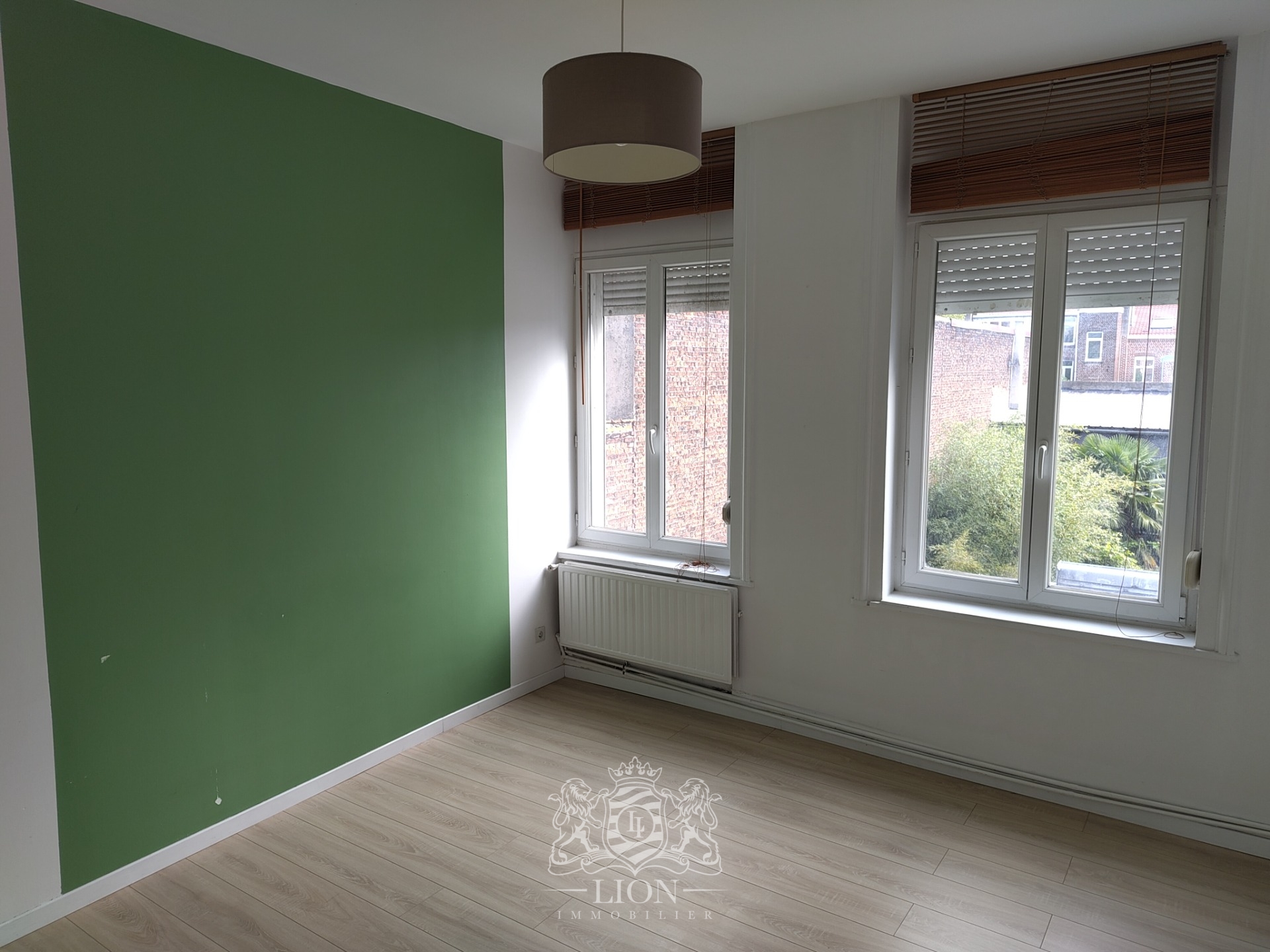 Rue gantois appartement type 2 50m Photo 4 - Le Lion Immobilier