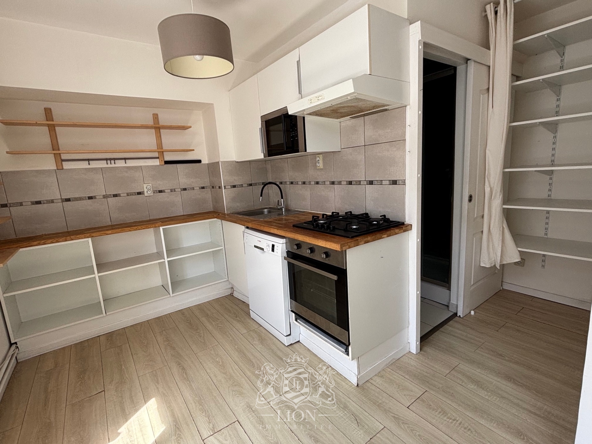 Rue gantois appartement type 2 50m Photo 4 - Le Lion Immobilier