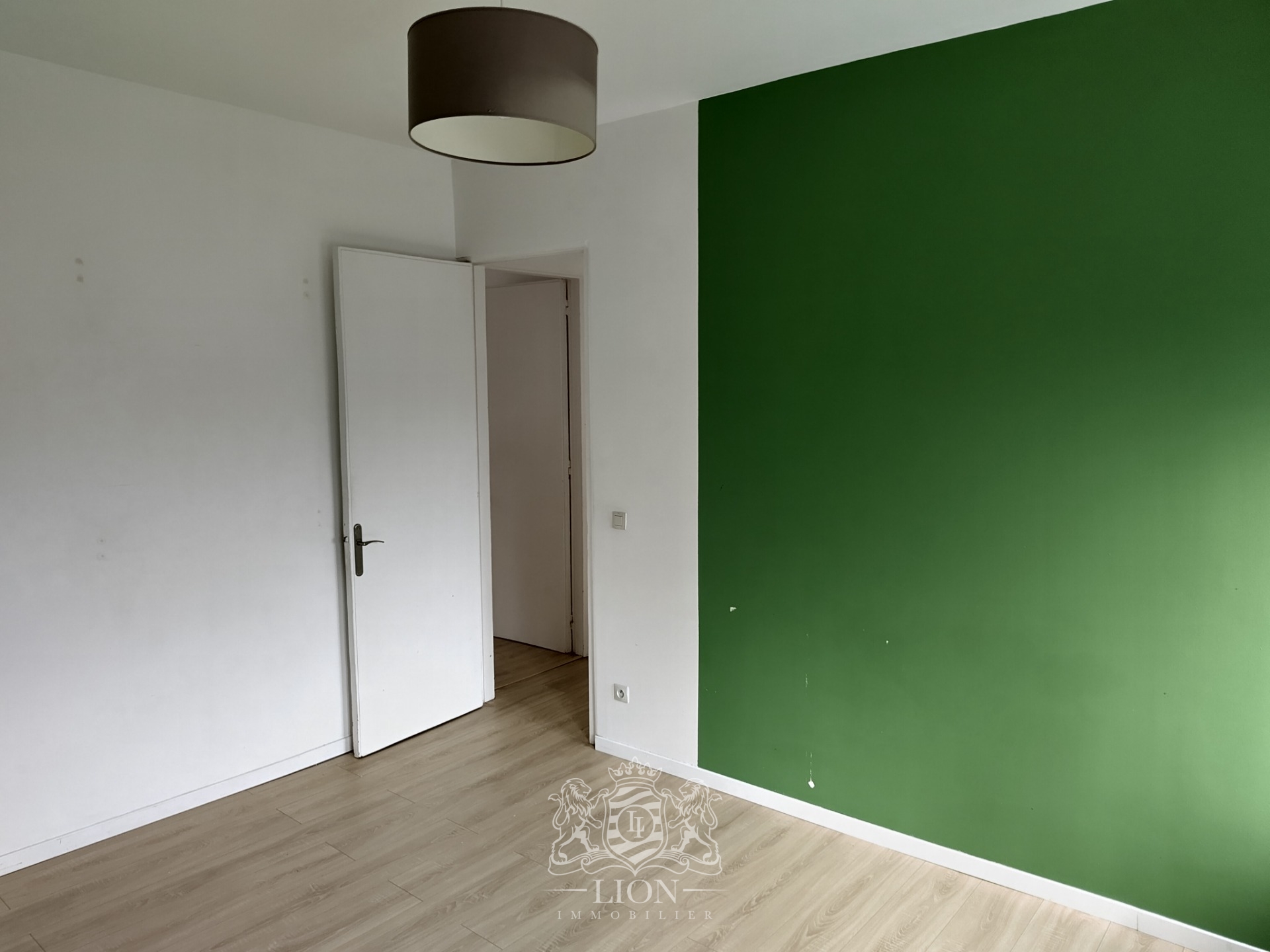 Rue gantois appartement type 2 50m Photo 5 - Le Lion Immobilier