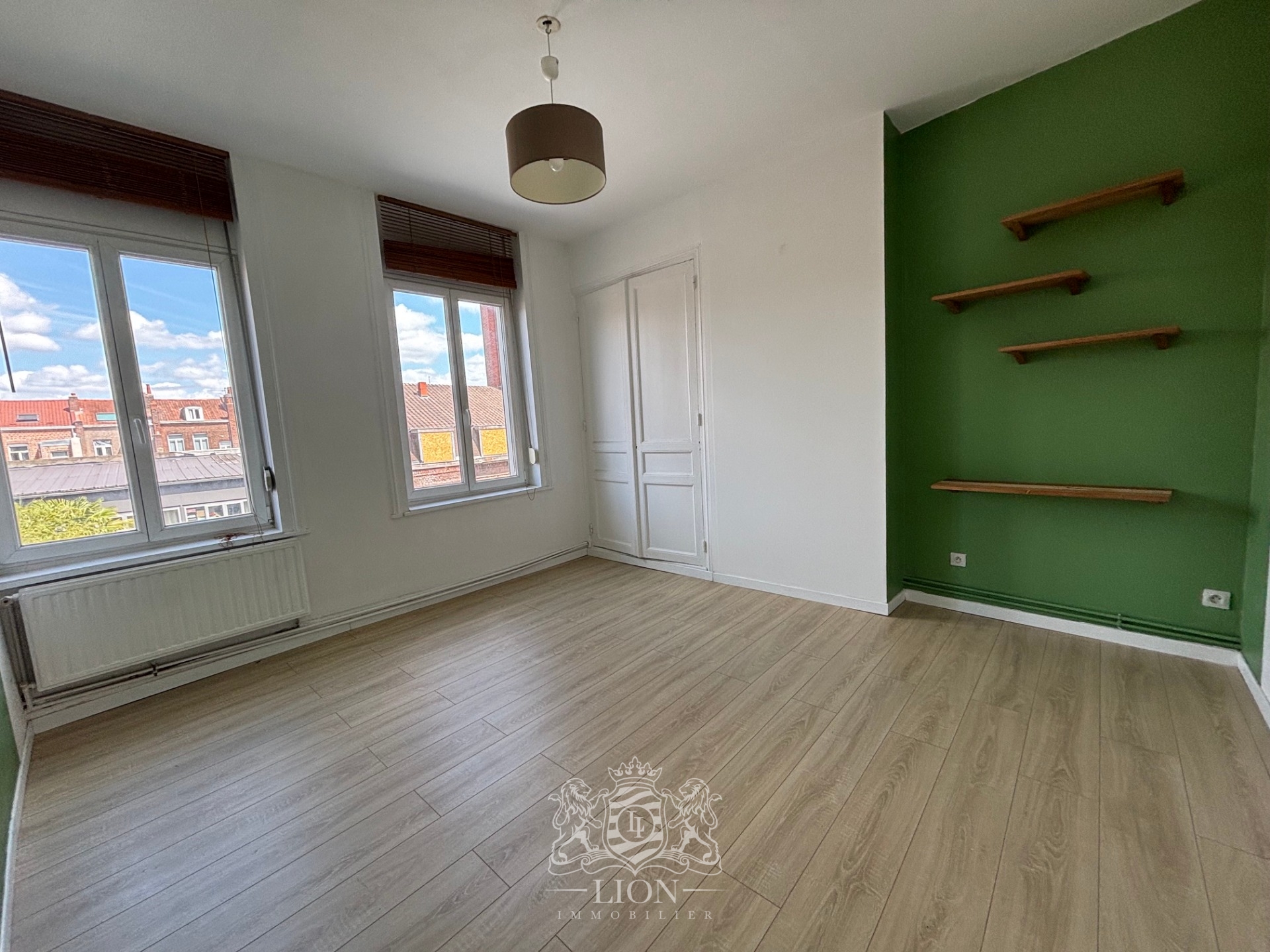 Rue gantois appartement type 2 50m Photo 5 - Le Lion Immobilier