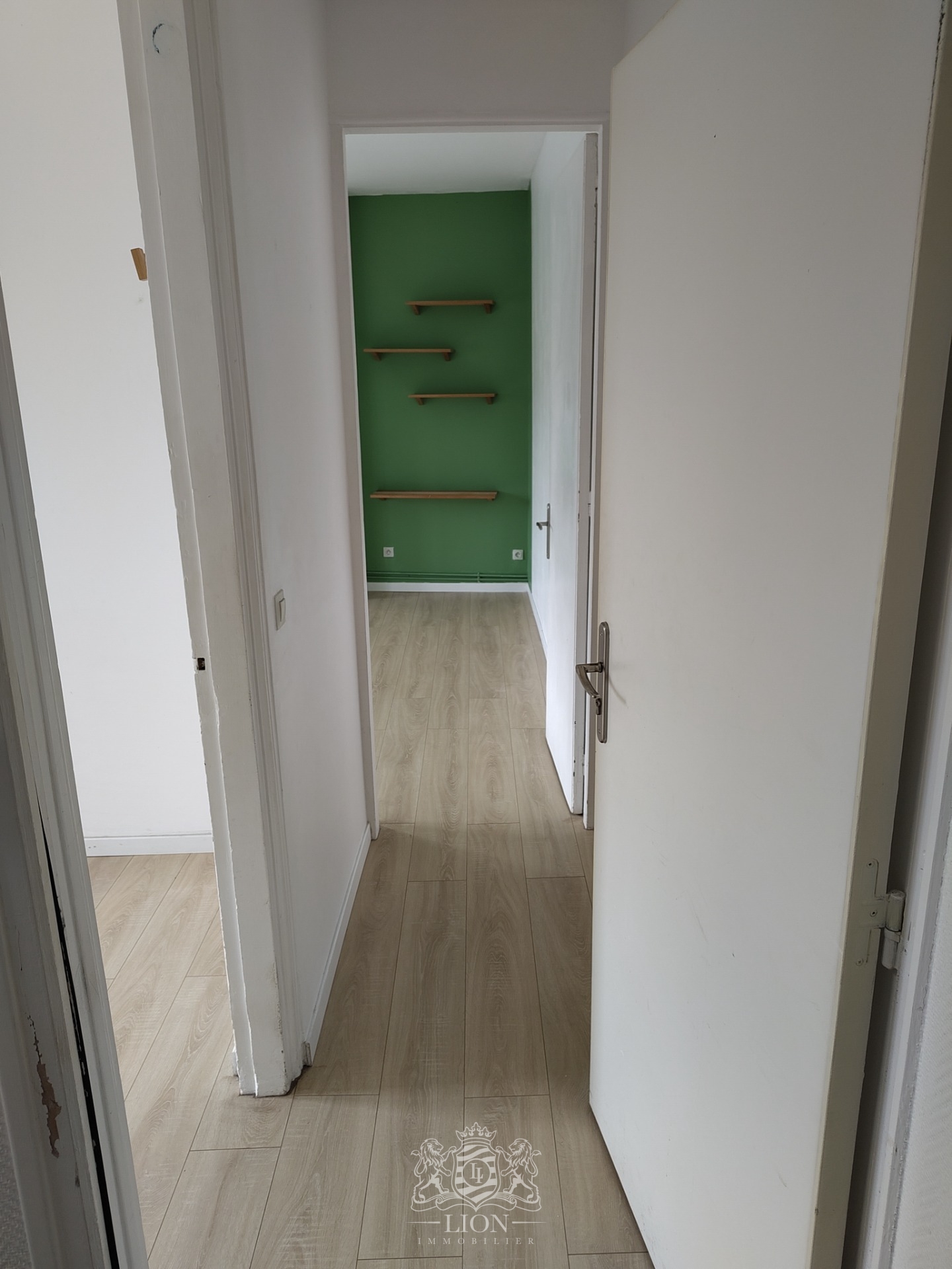 Rue gantois appartement type 2 50m Photo 6 - Le Lion Immobilier