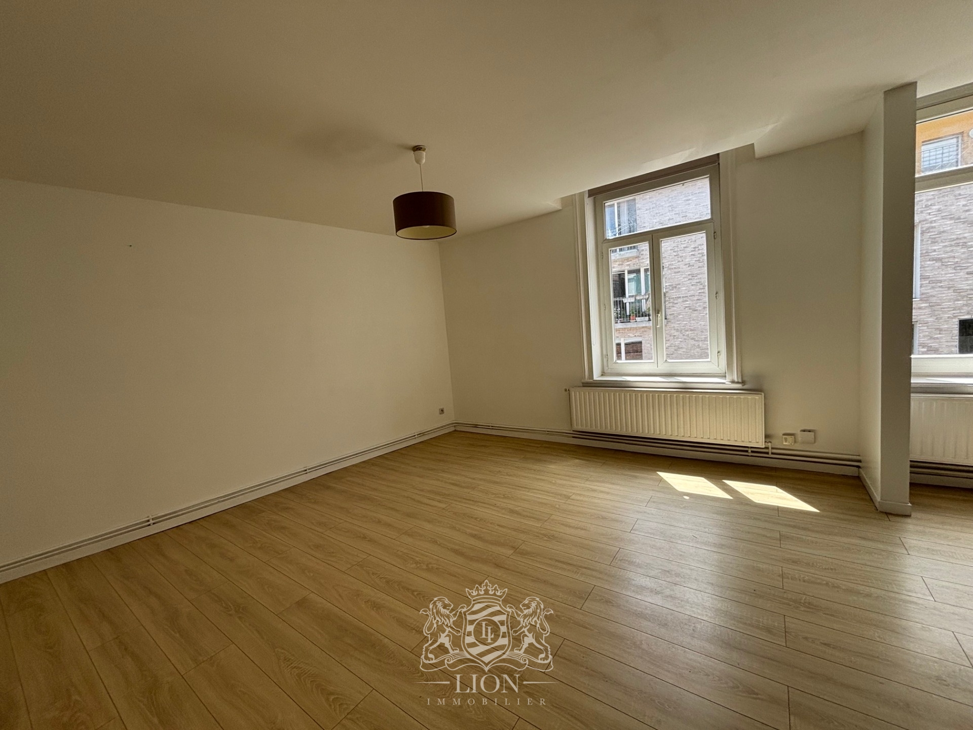 Rue gantois appartement type 2 50m Photo 9 - Le Lion Immobilier