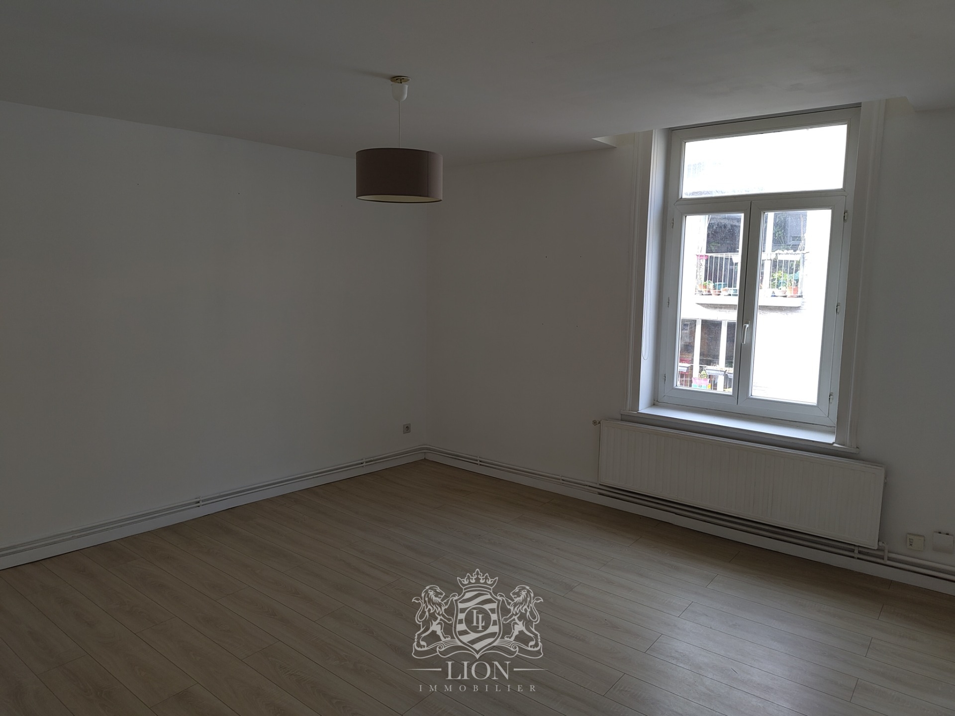 Rue gantois appartement type 2 50m Photo 11 - Le Lion Immobilier