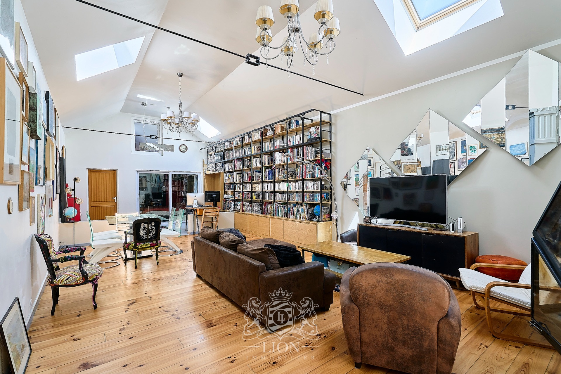 Appartement esprit loft avec garage et studio Photo 1 - Le Lion Immobilier