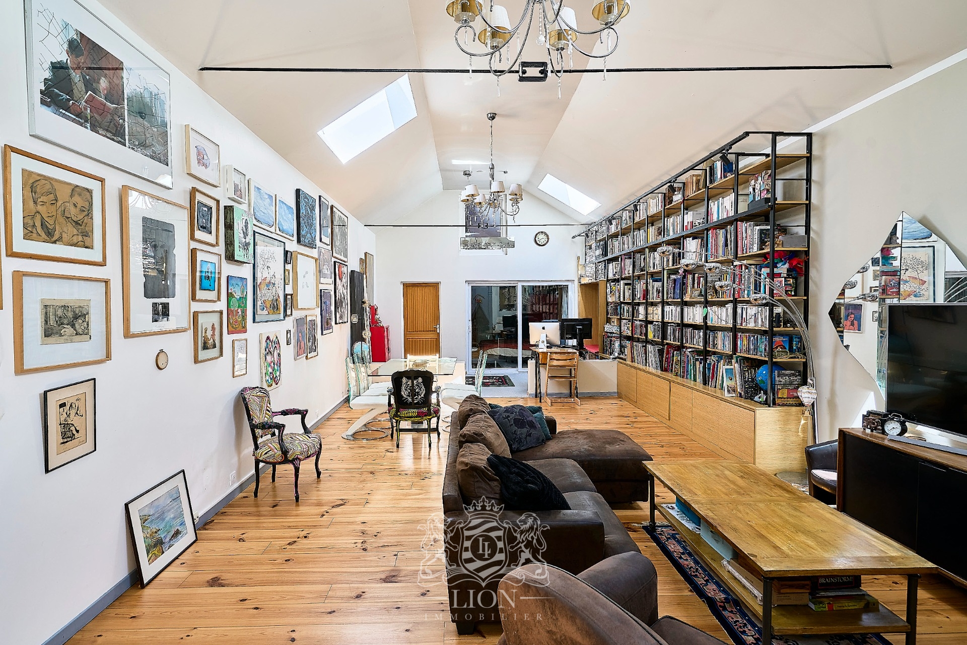 Appartement esprit loft avec garage et studio Photo 2 - Le Lion Immobilier