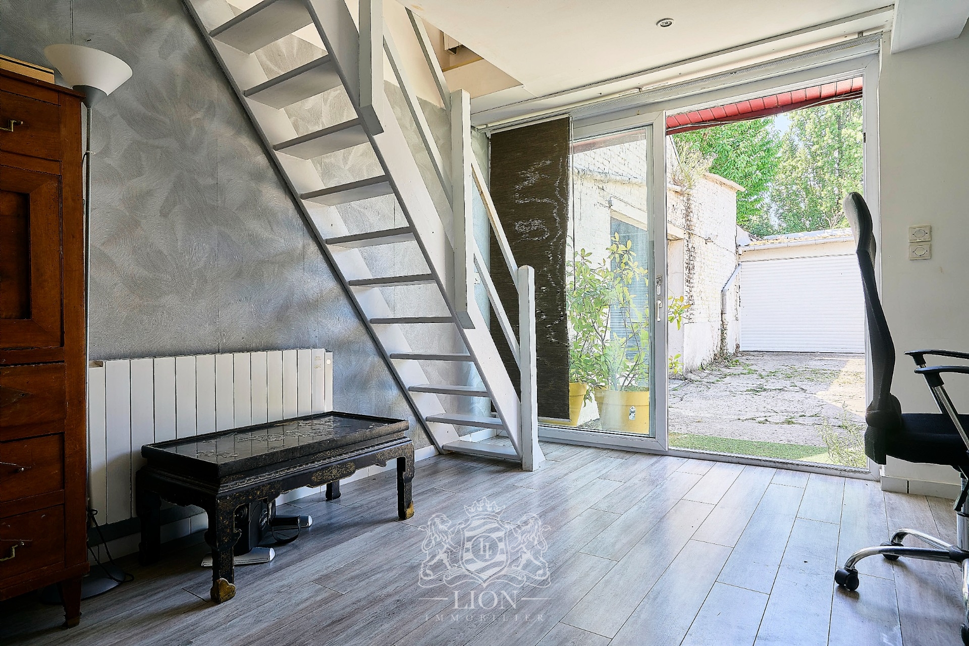 Appartement esprit loft avec garage et studio Photo 8 - Le Lion Immobilier