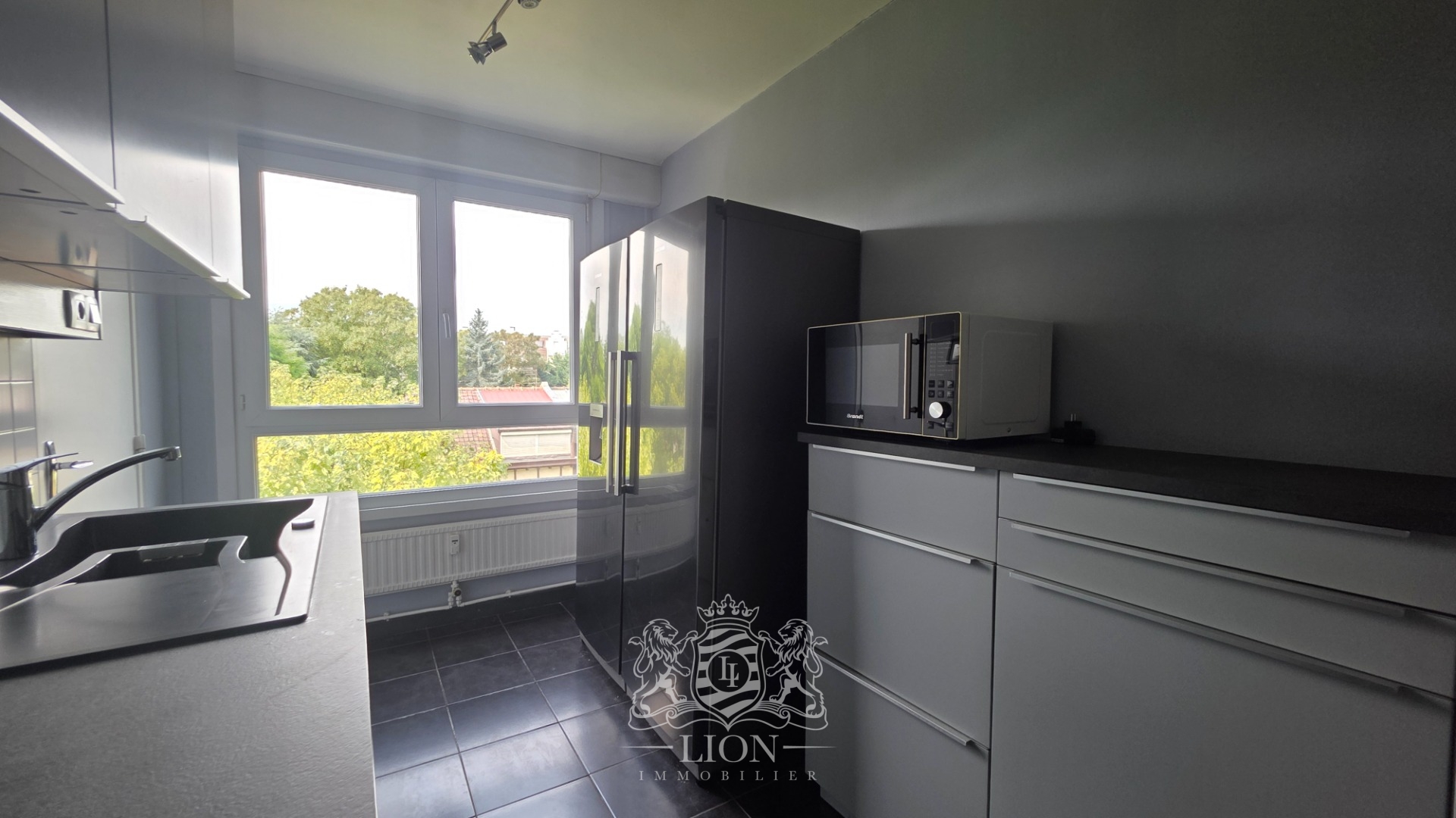 Appartement t4 garage et espaces verts Photo 2 - Le Lion Immobilier Appartement t4 garage et espaces verts Photo 2 - Le Lion Immobilier