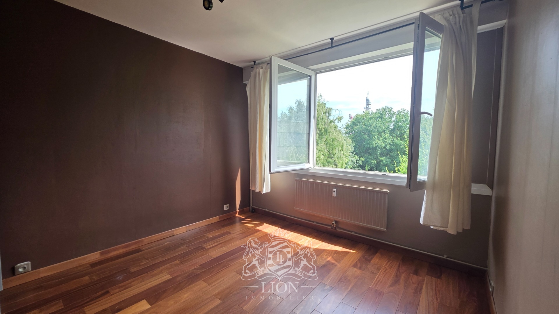 Appartement t4 garage et espaces verts Photo 3 - Le Lion Immobilier Appartement t4 garage et espaces verts Photo 3 - Le Lion Immobilier