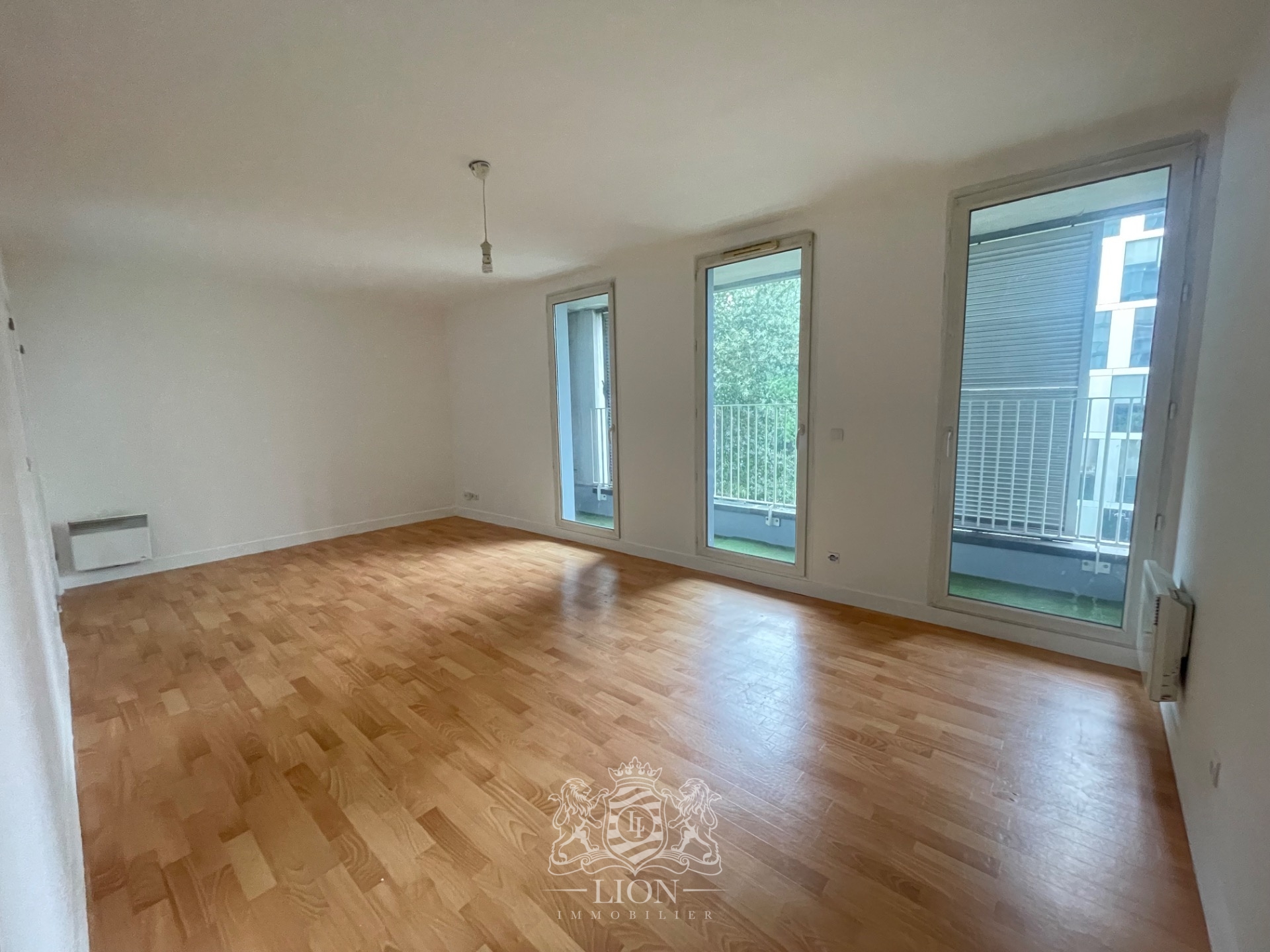 Appartement 2 chambres avec balcon et parking Photo 1 - Le Lion Immobilier Appartement 2 chambres avec balcon et parking Photo 1 - Le Lion Immobilier