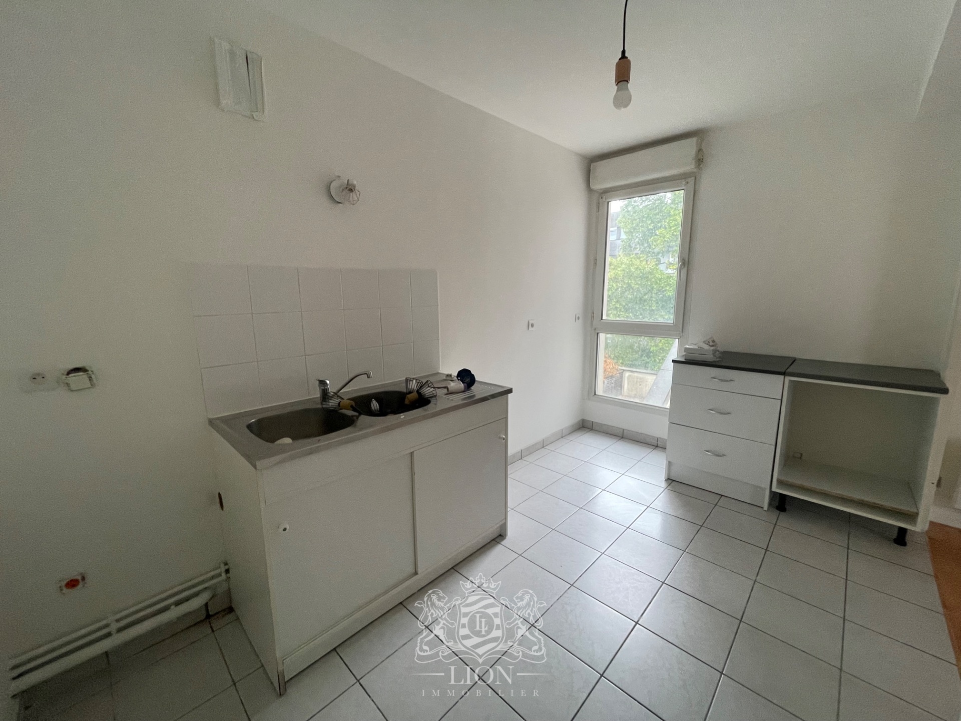 Appartement 2 chambres avec balcon et parking Photo 4 - Le Lion Immobilier Appartement 2 chambres avec balcon et parking Photo 4 - Le Lion Immobilier