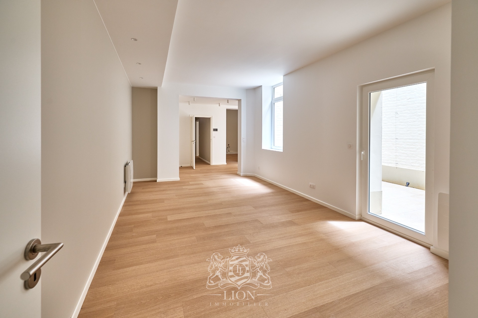 Appartement renove avec terrasse possibilite garage Photo 3 - Le Lion Immobilier Appartement renove avec terrasse possibilite garage Photo 3 - Le Lion Immobilier