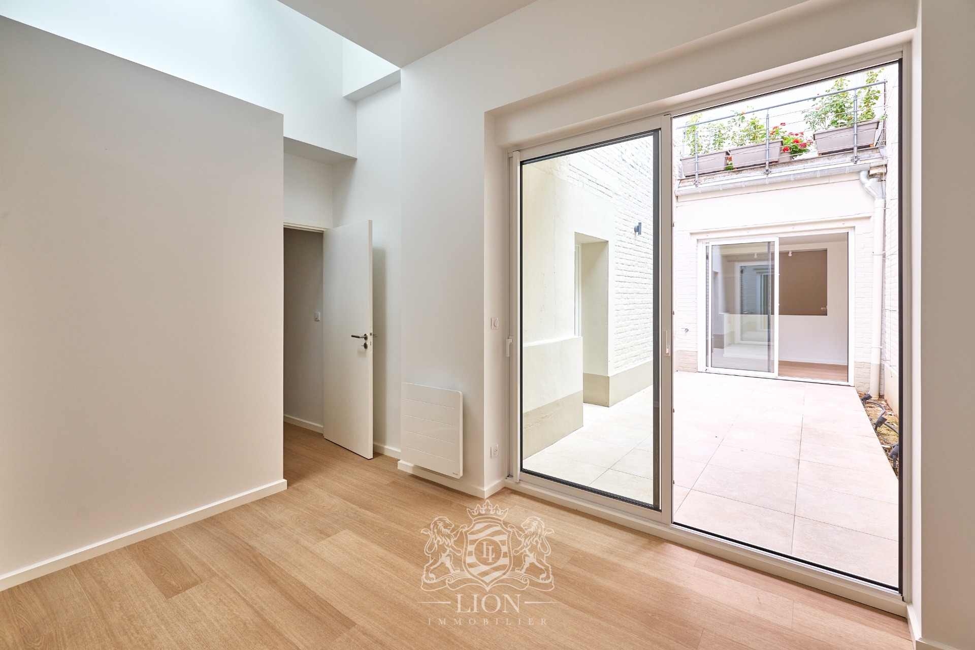Appartement renove avec terrasse possibilite garage Photo 8 - Le Lion Immobilier Appartement renove avec terrasse possibilite garage Photo 8 - Le Lion Immobilier